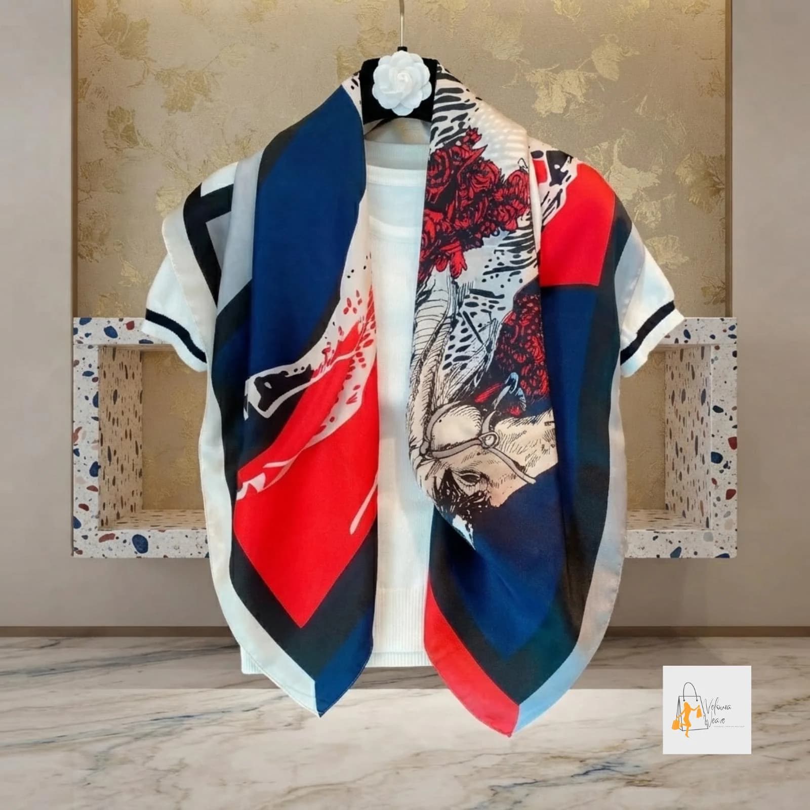 Large striped scarf styled around the neck with a classic outfit.