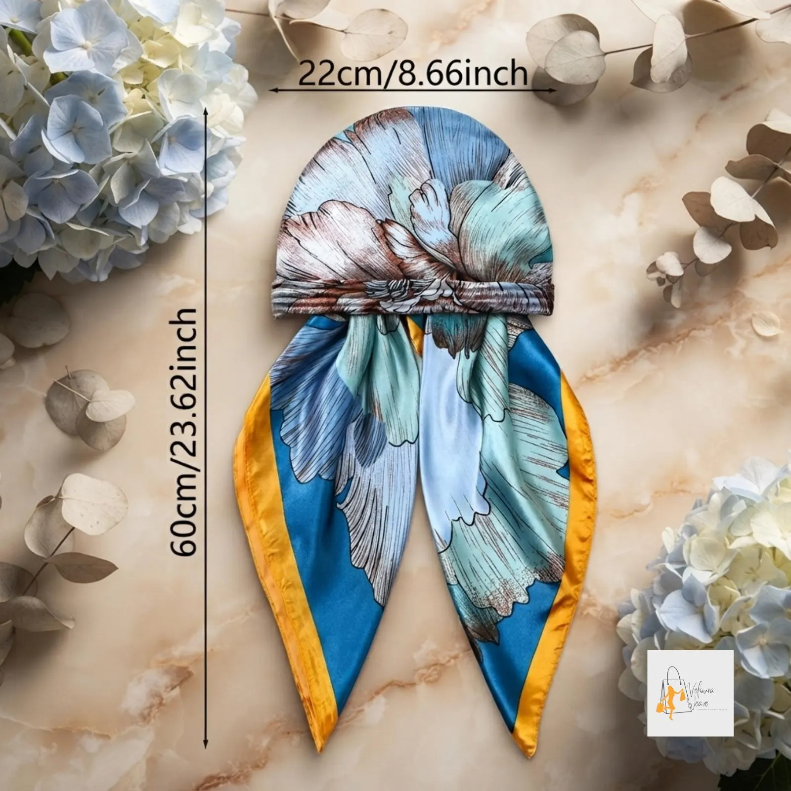 Printed hijab neatly draped over a mannequin.