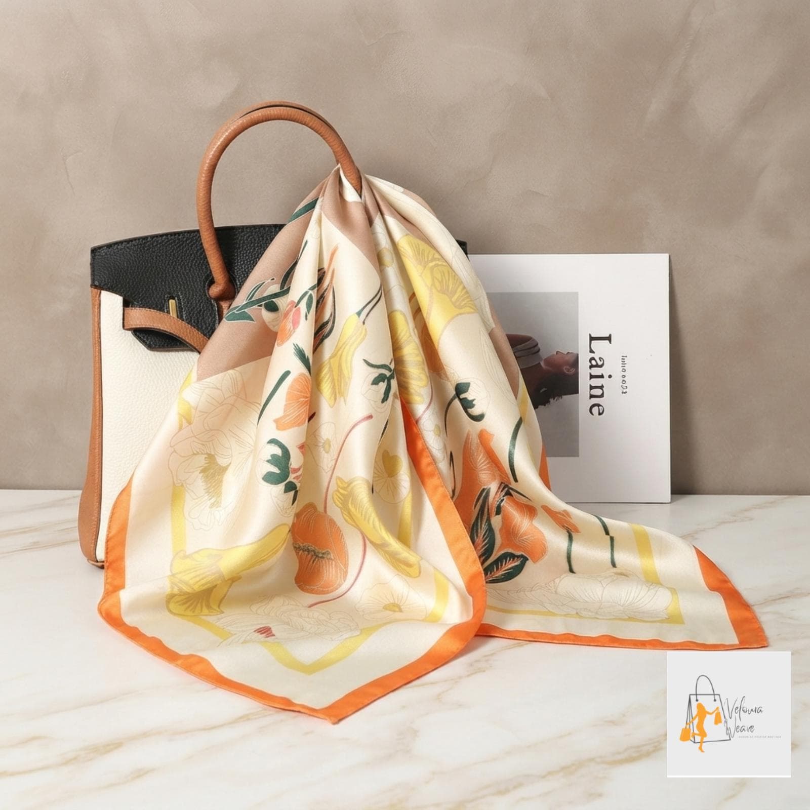Lightweight floral square scarf for everyday fashion styling.
