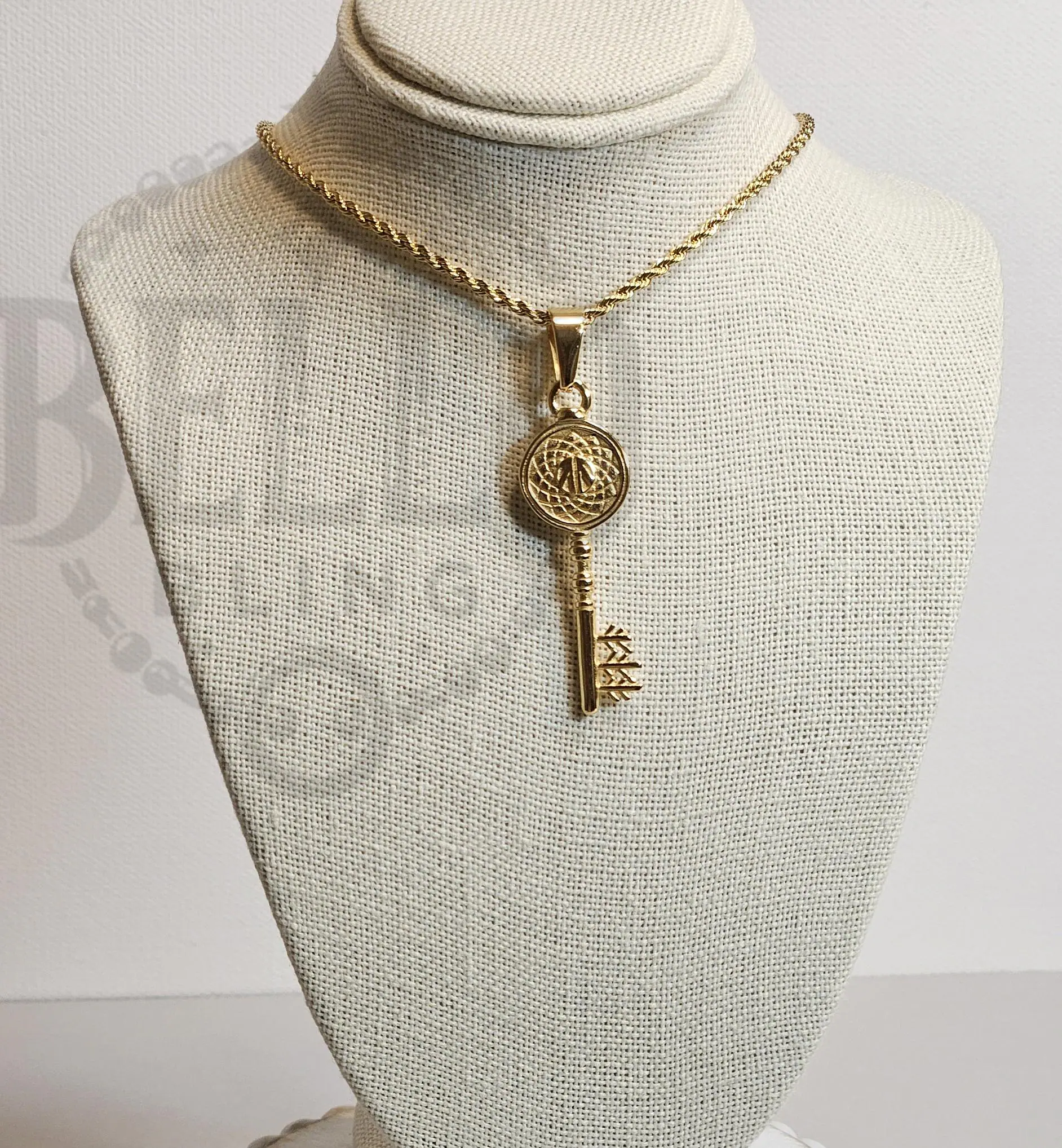 Gold key pendant necklace,Key necklace, Unique key necklace, Trendy necklace for women, Elegant key pendant, Key charm jewelry, Birthday gift necklace, Gold key pendant online, Best gold key charm necklace, Stylish gold necklaces for women.
