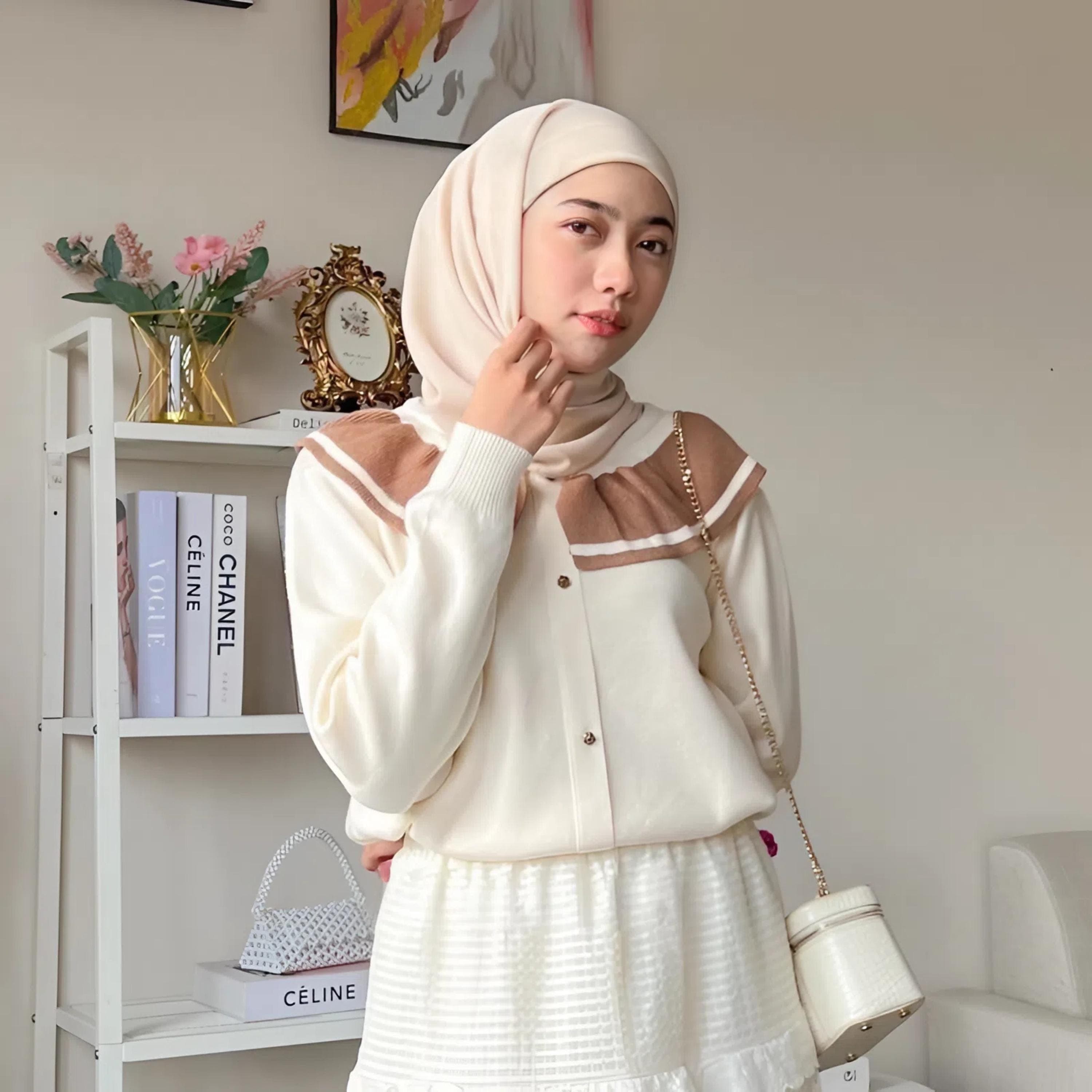 Women knit sweater top with layered collar detail in neutral color, styled for modest everyday wear