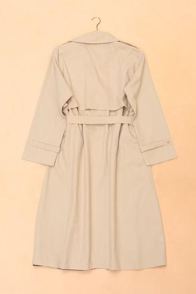 Women’s long khaki trench coat made from twill with belt, double-breasted buttons, waterproof and windproof design.