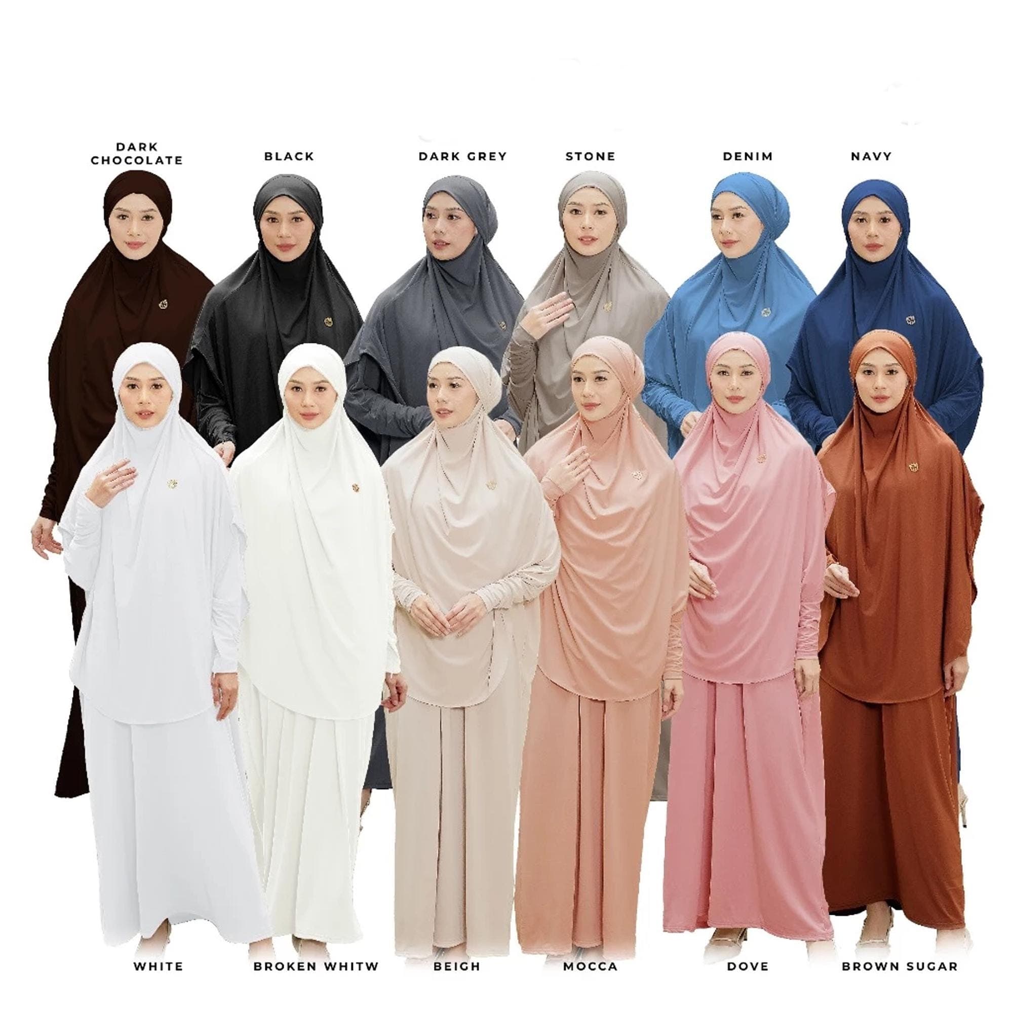 An oversized dark grey jersey abaya set with a matching long khimar worn by a woman in a minimalist setting.