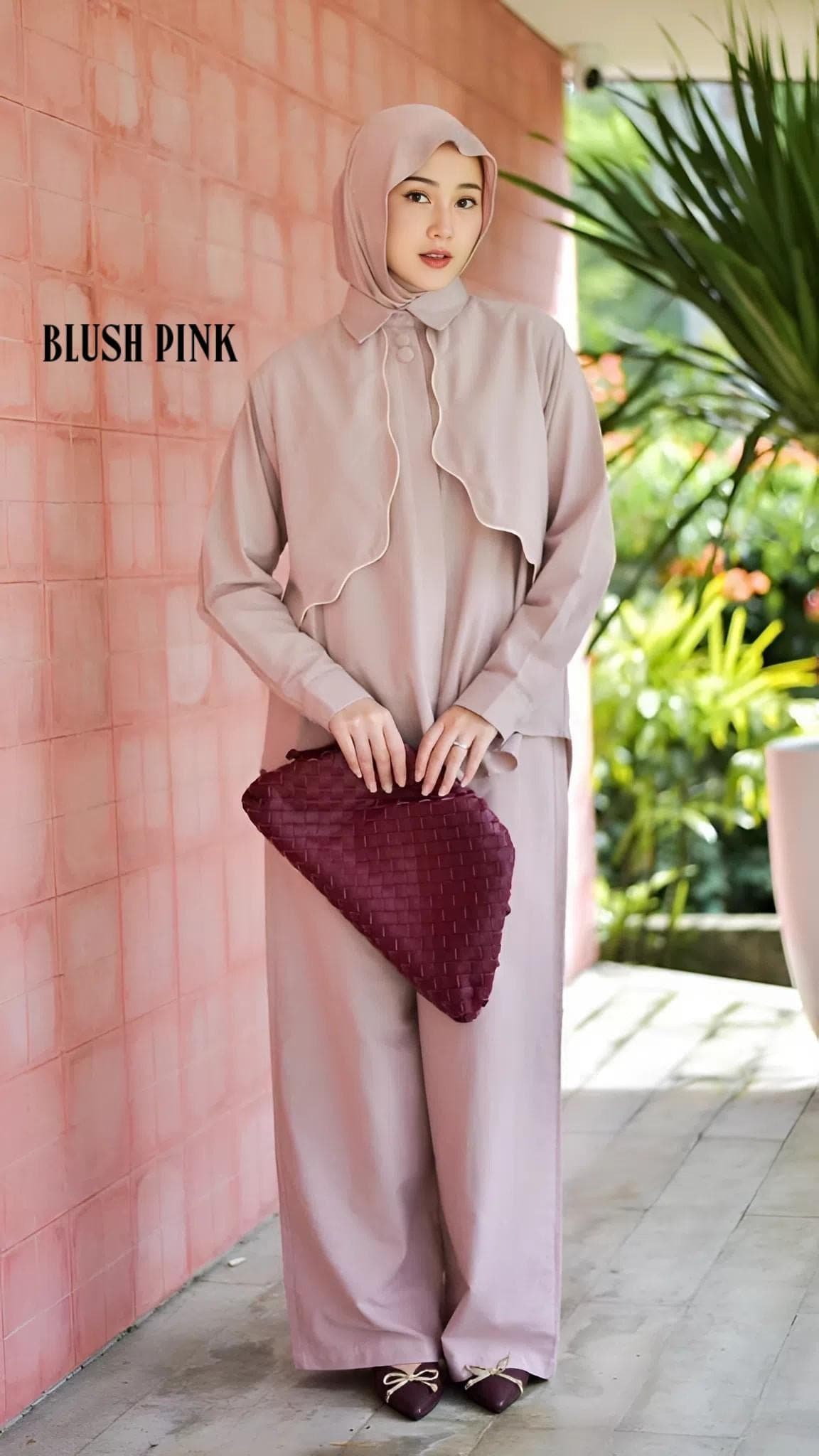 A premium linen two-piece outfit featuring a long-sleeve shirt and wide-leg pants in neutral earthy tones, styled for modest fashion.