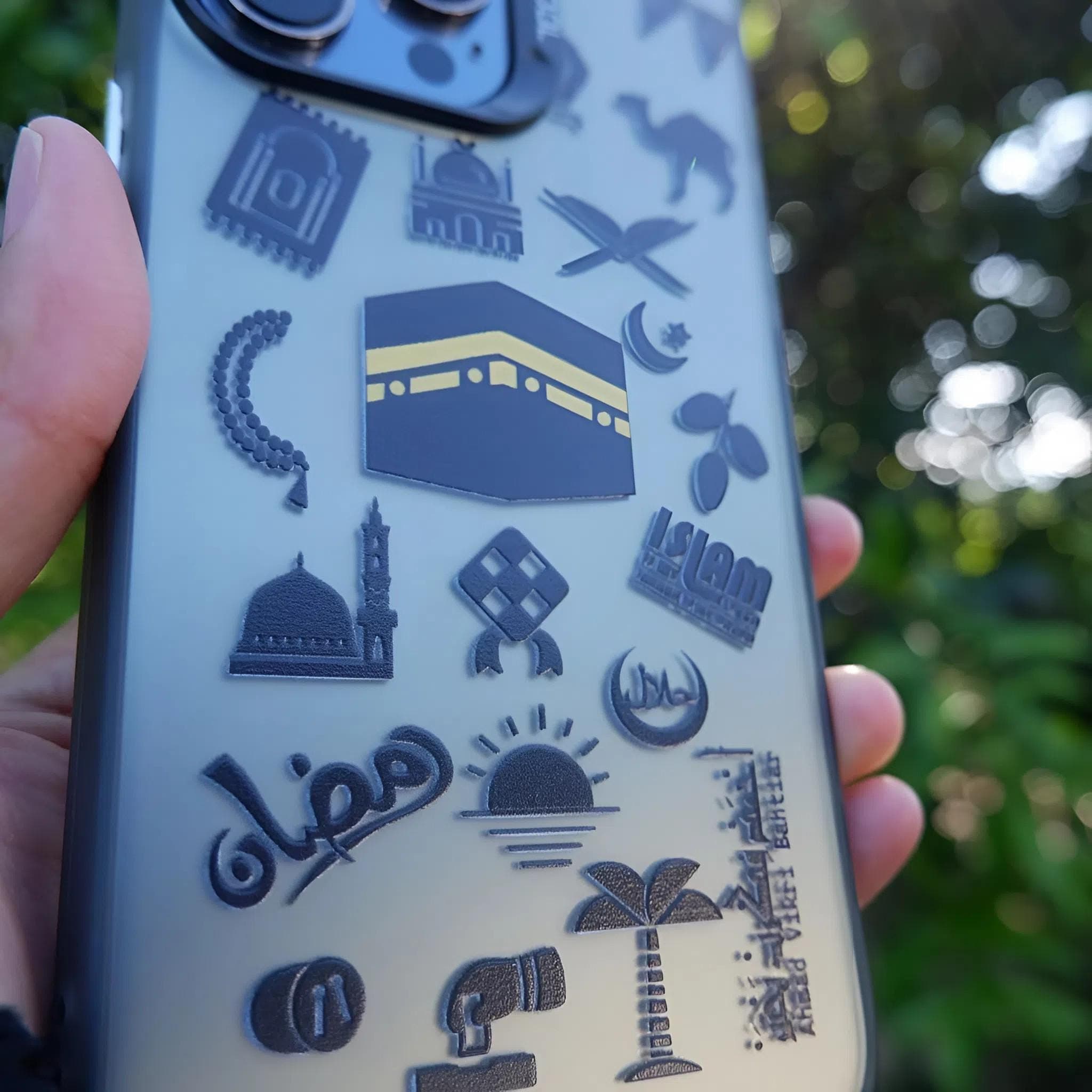 A premium black matte phone case featuring a detailed gold-printed Ottoman Empire emblem with historical weapons and shields.