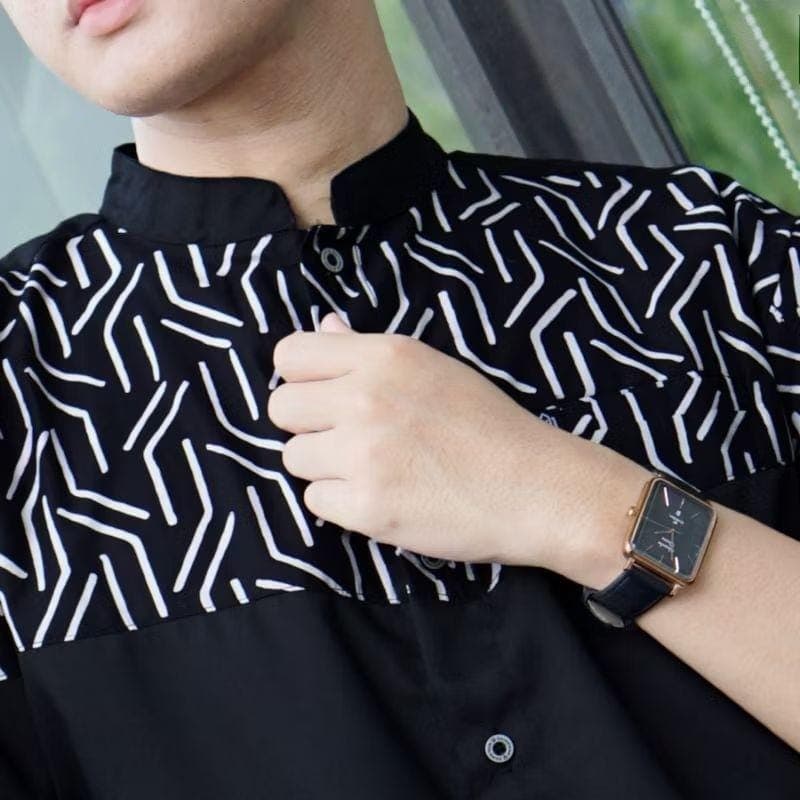 “Men’s white shirt with blue geometric chest print, made from premium anti-wrinkle cotton blend”
