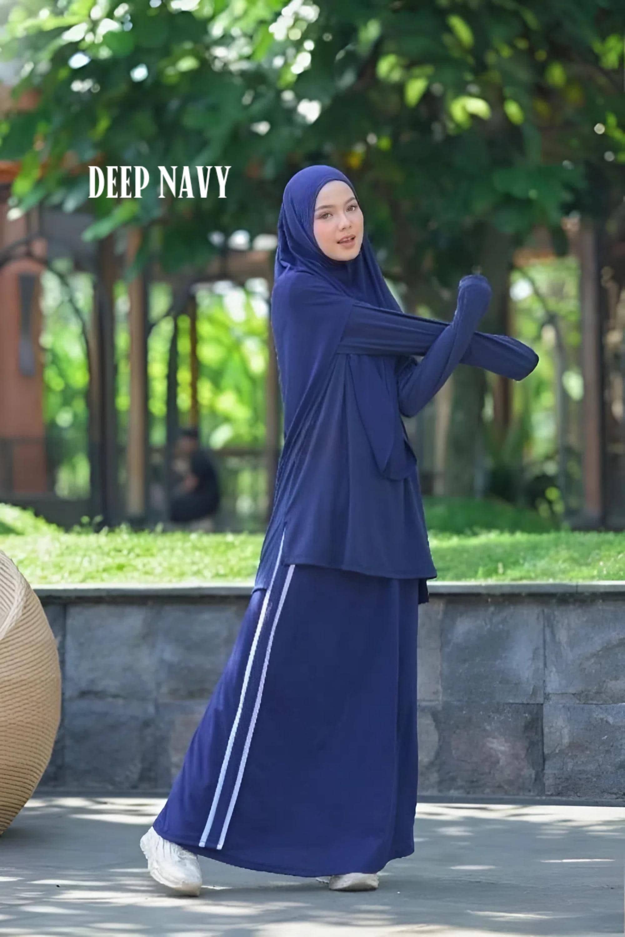 Modest Muslim workout set with long sleeve top, wide leg pants, and bergo hijab in breathable cotton rayon fabric