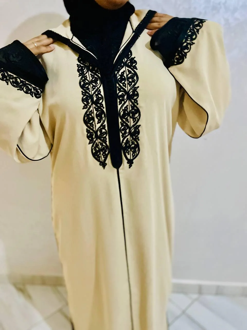 Beige Moroccan djellaba for women with black embroidery and sfifa trim, traditional handbeaded jellaba
