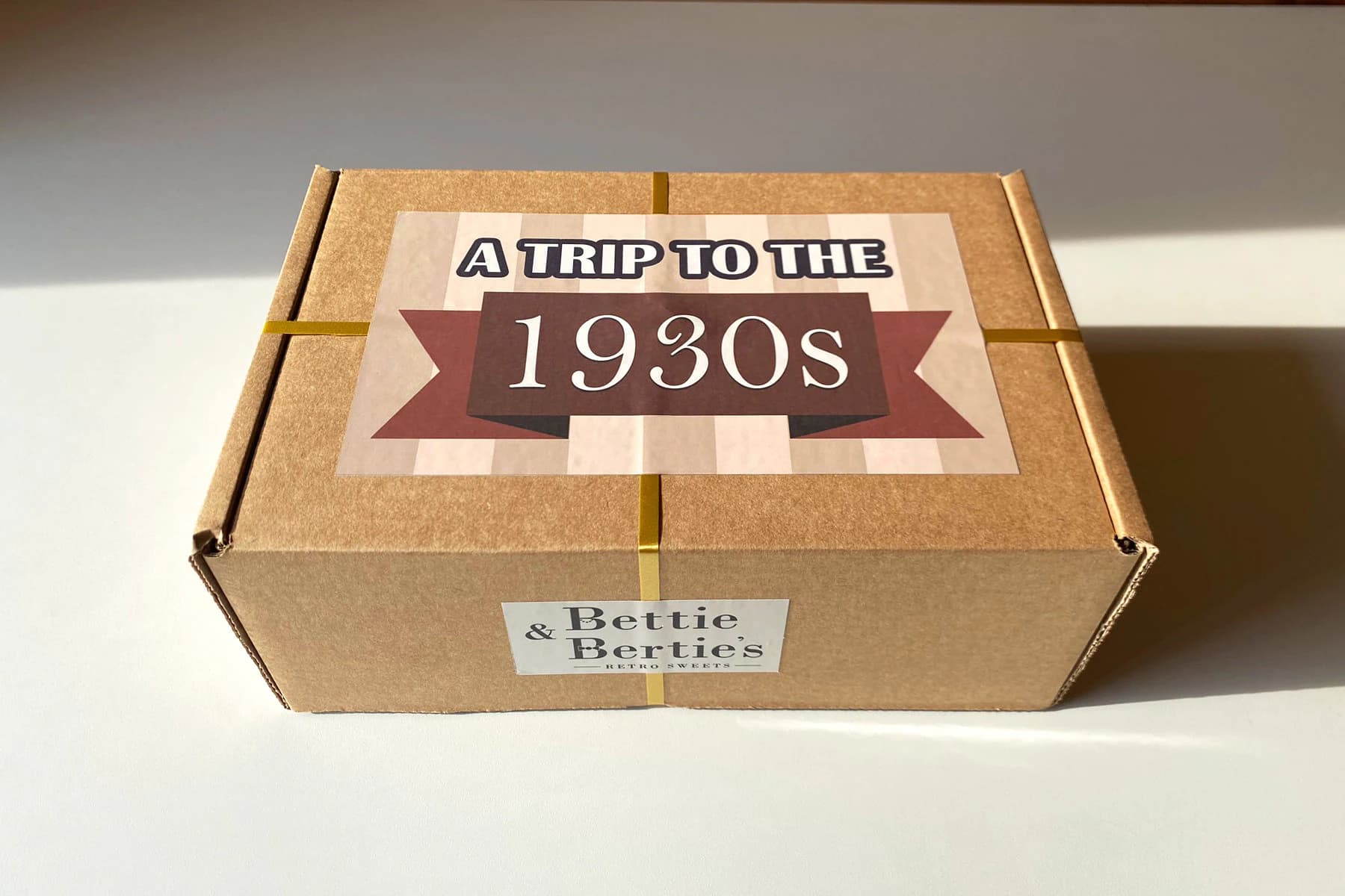 Box of popular 1930s sweets, including: Bonfire Toffee Lolly, Fry's Chocolate Cream, Liquorice Hard Stick