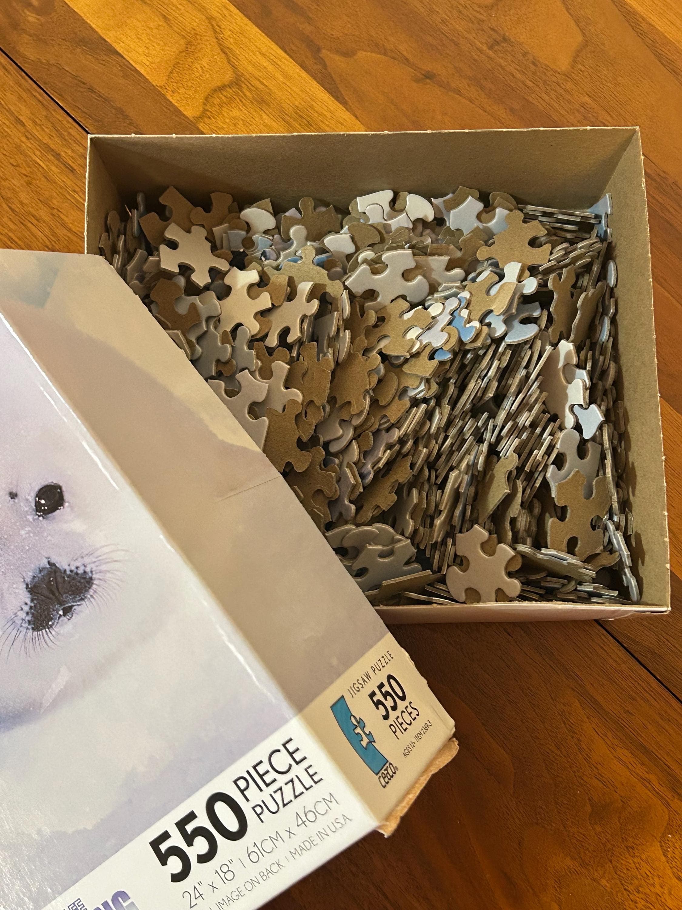 Ceaco Vanishing Act Jigsaw Puzzle - Art Wolfe Seal Image - 550 Pieces