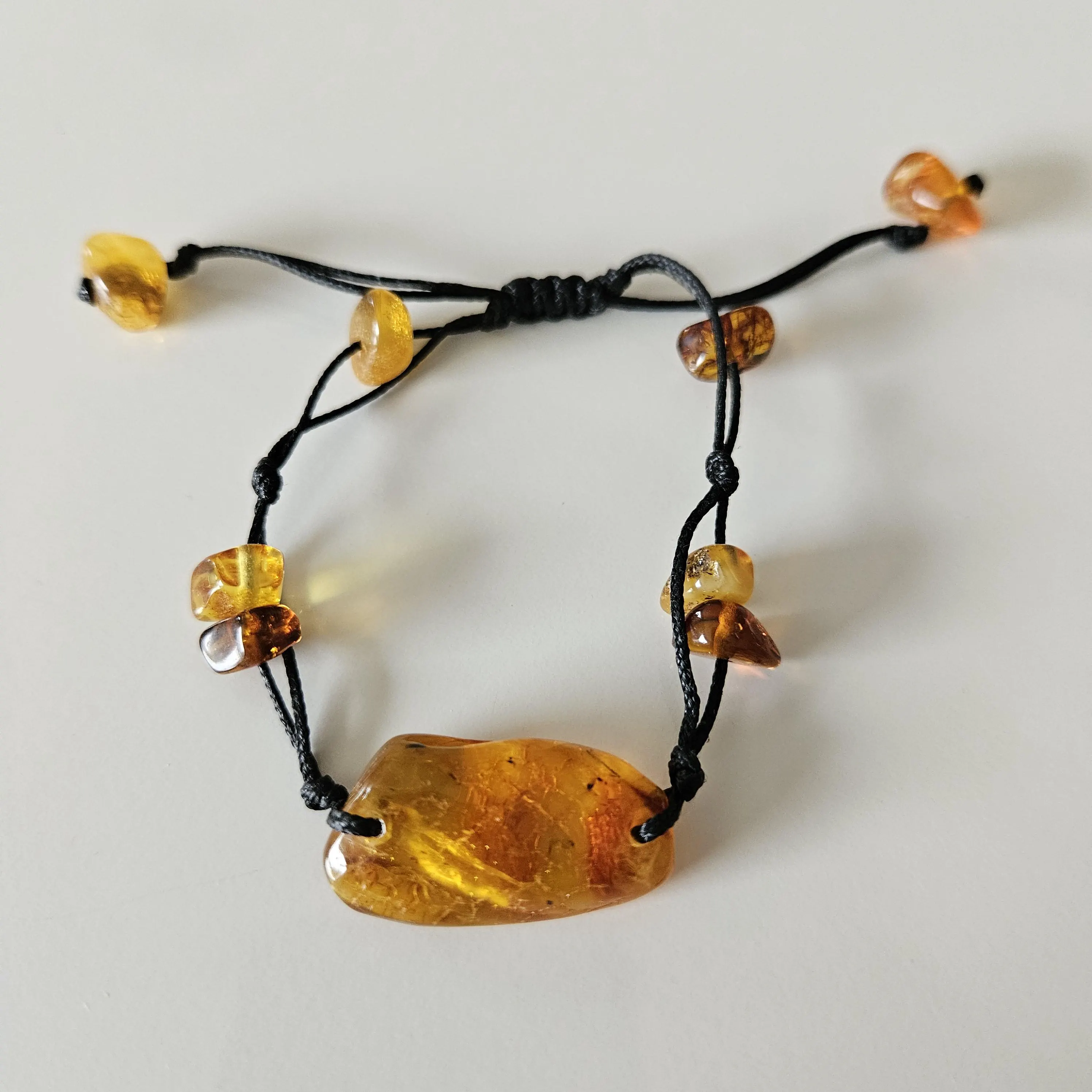 Handmade Baltic Amber Bracelet with Large Centerpiece Stone – An Amulet of Sun and Nature