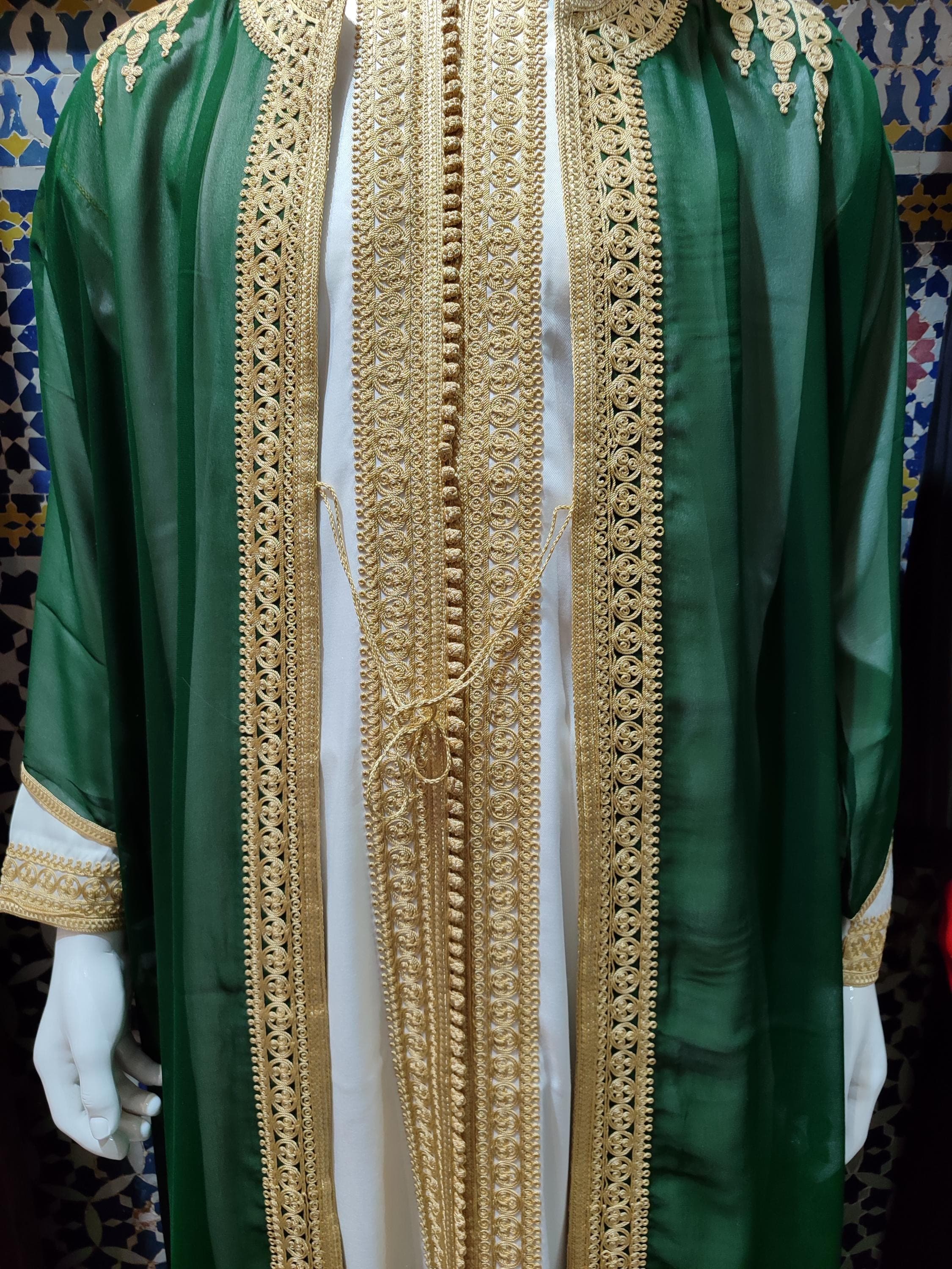 Elevate your special day with this wedding jabador—crafted in Morocco with rich Moroccan embroidery and detailed golden accents. This traditional jabador set includes three elegant pieces and works beautifully as a nikah jabador, Eid clothing, or Ramadan attire. Whether you're celebrating a wedding or a religious occasion, this jabador homme offers the perfect balance of luxury and cultural pride.