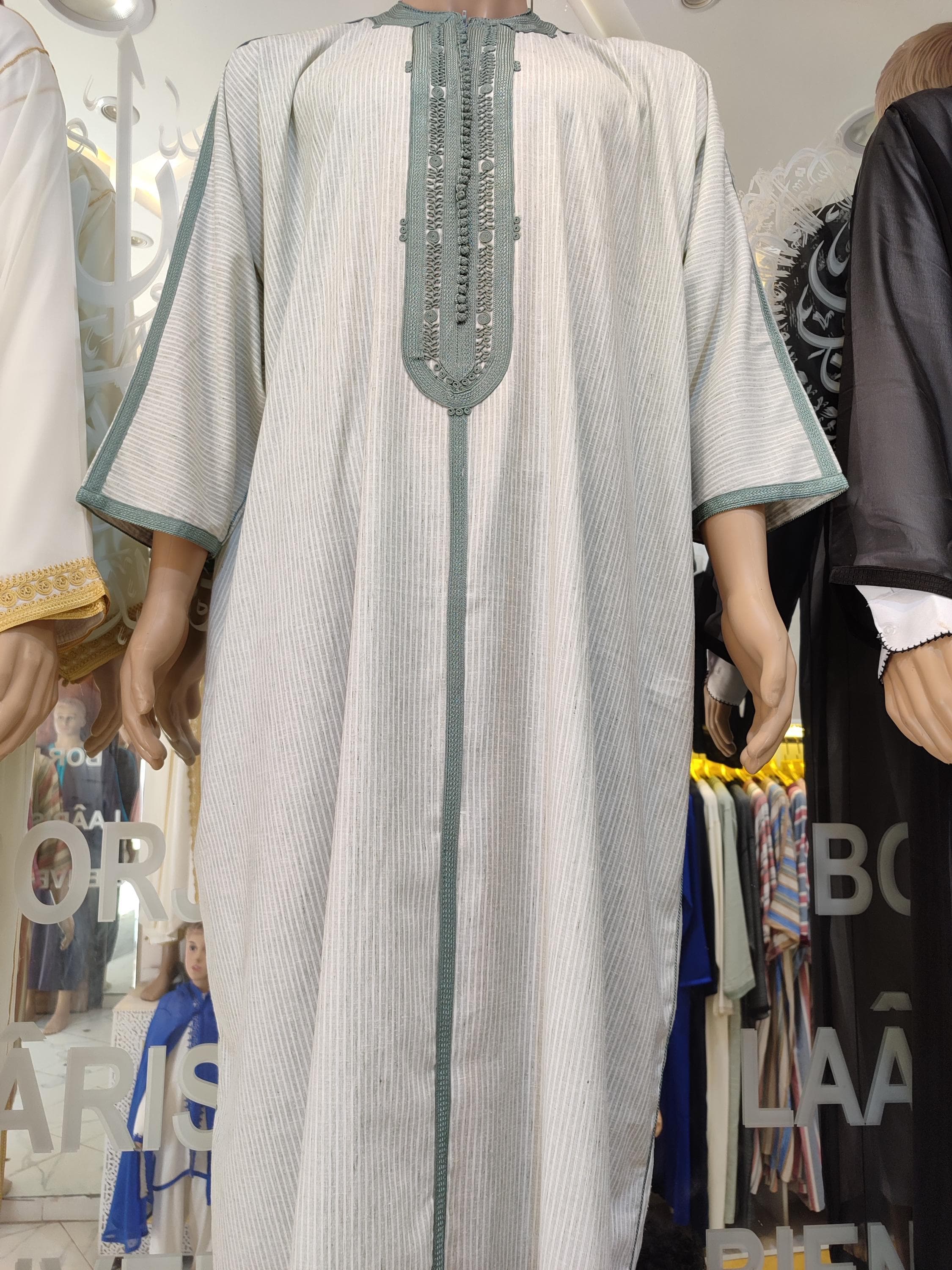 Our gandoura for men combines traditional Moroccan tailoring with modern comfort. Made from high-quality cotton, this thobe features subtle embroidery details that reflect authentic Moroccan craftsmanship. The ankle-length kandoura cubbe design offers full coverage for Islamic prayer, while the relaxed fit ensures all-day comfort. Ideal as a Muslim long kurta or everyday Arabic dress, this jubbah comes in versatile neutral tones that complement any wardrobe.