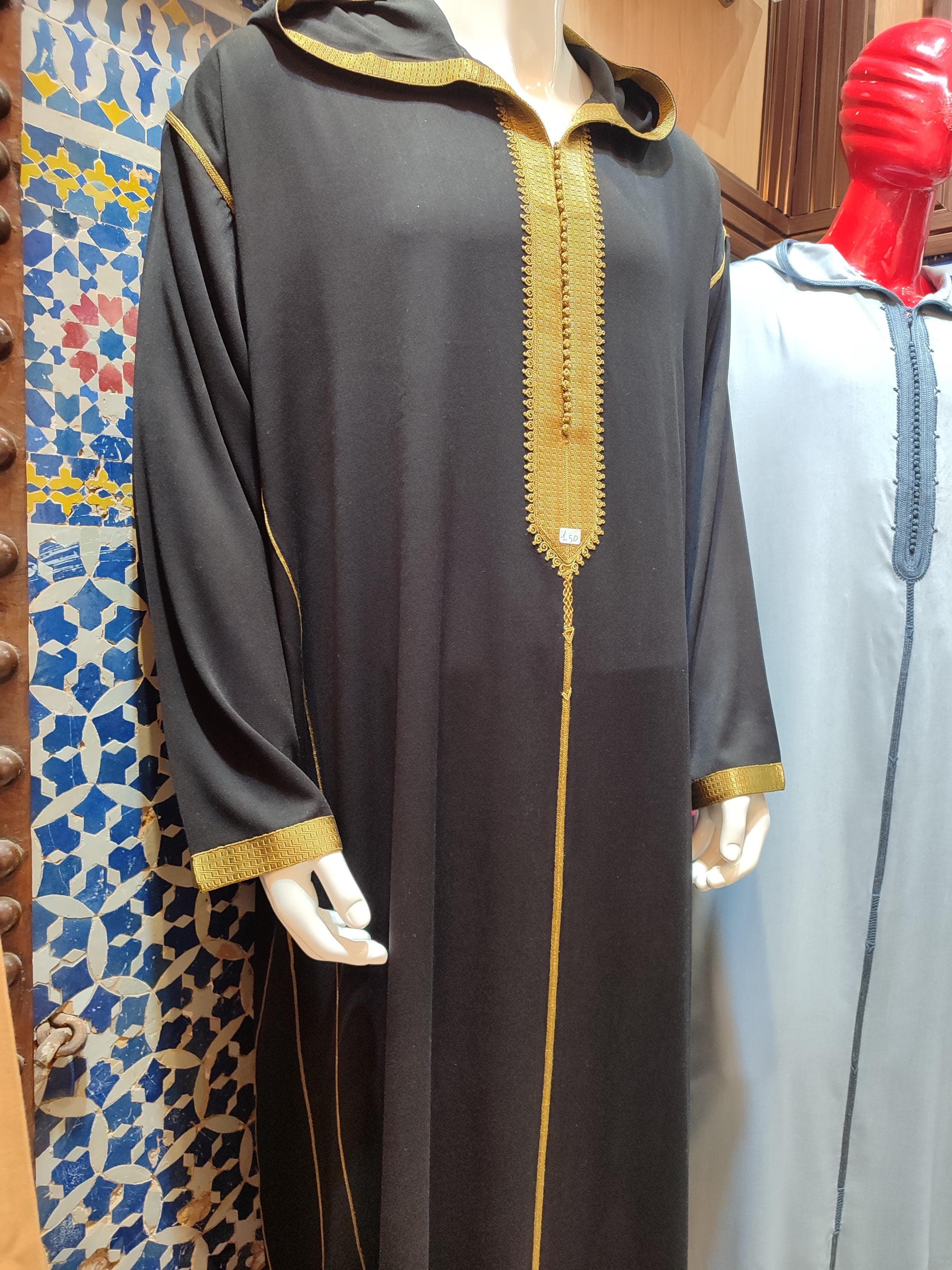 This hooded thobe combines luxury and tradition, making it a standout piece for weddings, Eid, and other celebrations. The intricate embroidery and premium fabric reflect its handmade quality, while the relaxed fit ensures comfort. Designed as a luxury kaftan, it is perfect for those who appreciate refined Moroccan fashion. The versatile design allows it to be worn for both religious and social events, making it a valuable addition to any wardrobe.
