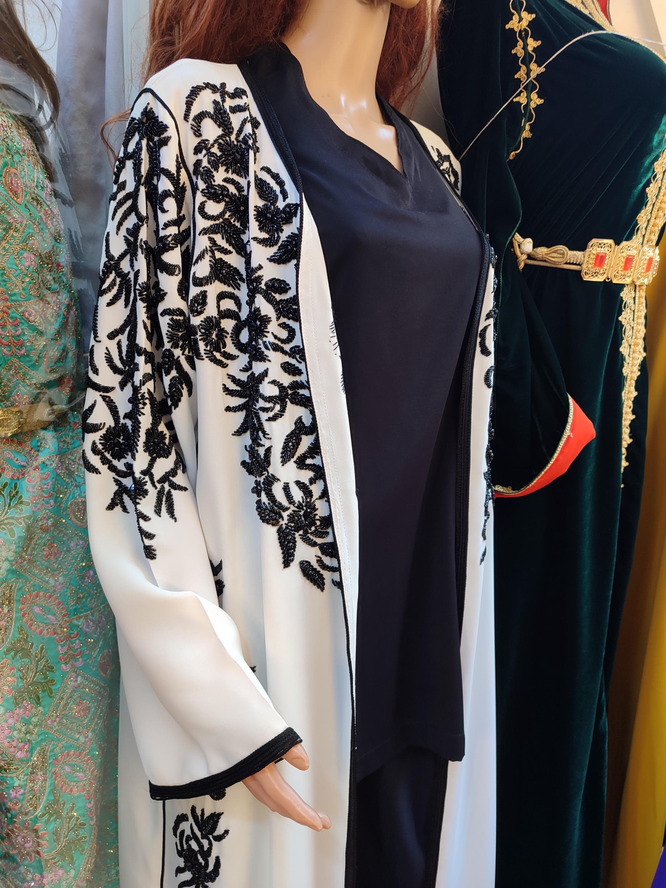 Our premium jellaba ramadan collection showcases the finest stylish georgette fabrics adorned with intricate hand embroidery that honors Moroccan tradition. These djellaba femme designs feature lightweight, breathable materials perfect for warm evenings and festive gatherings during the holy month. Each jellaba Morocco piece in this collection balances modest fashion dress requirements with sophisticated detailing, creating versatile muslim women dress