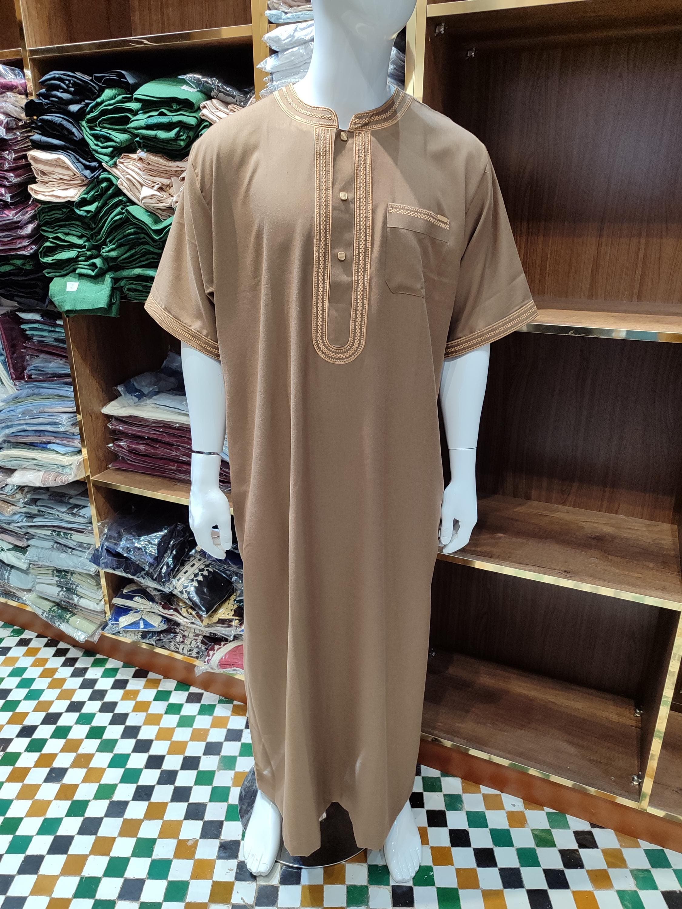 This embroidered Arabic robe brings together Moroccan heritage and modern Islamic style. Whether you call it a djellaba homme, wool jalabiya men, or jubba for men, it’s designed for elegance and spiritual presence. Featuring a hooded style for added character, this Moroccan thobe fits perfectly for daily prayers, Friday gatherings, or special occasions like Eid. A fine example of handmade djellaba and refined men’s Islamic wear.