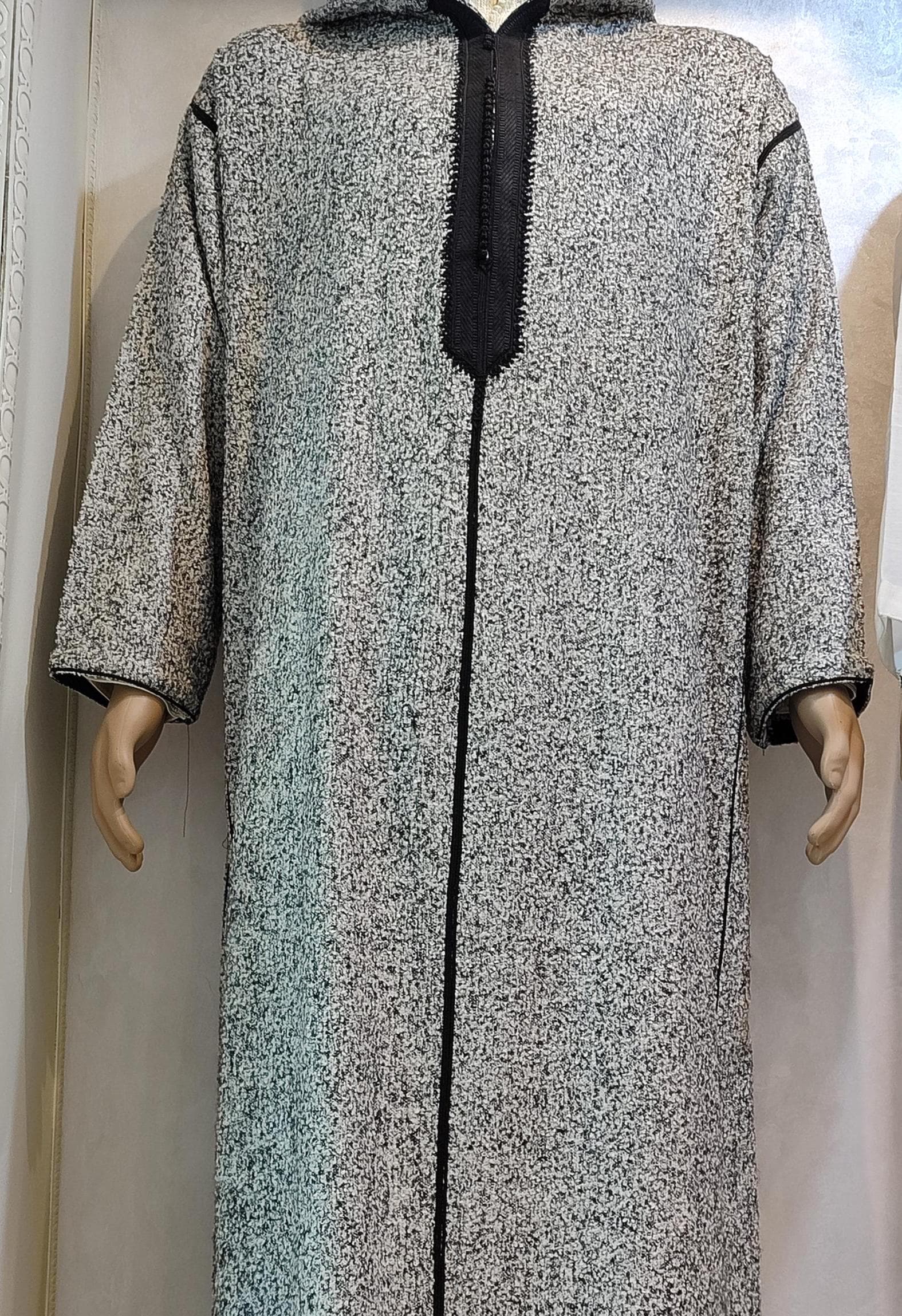 Elevate your wardrobe with this exquisite Moroccan kaftan, a stunning kaftan long dress perfect for special occasions. This handmade djellaba dress blends traditional Moroccan artisan techniques with modern bohemian style. Made from premium fabrics, this kaftan dress works as elegant loungewear or a statement Ramadan dress. Ideal for women seeking unique African dress styles with authentic Moroccan fashion heritage.