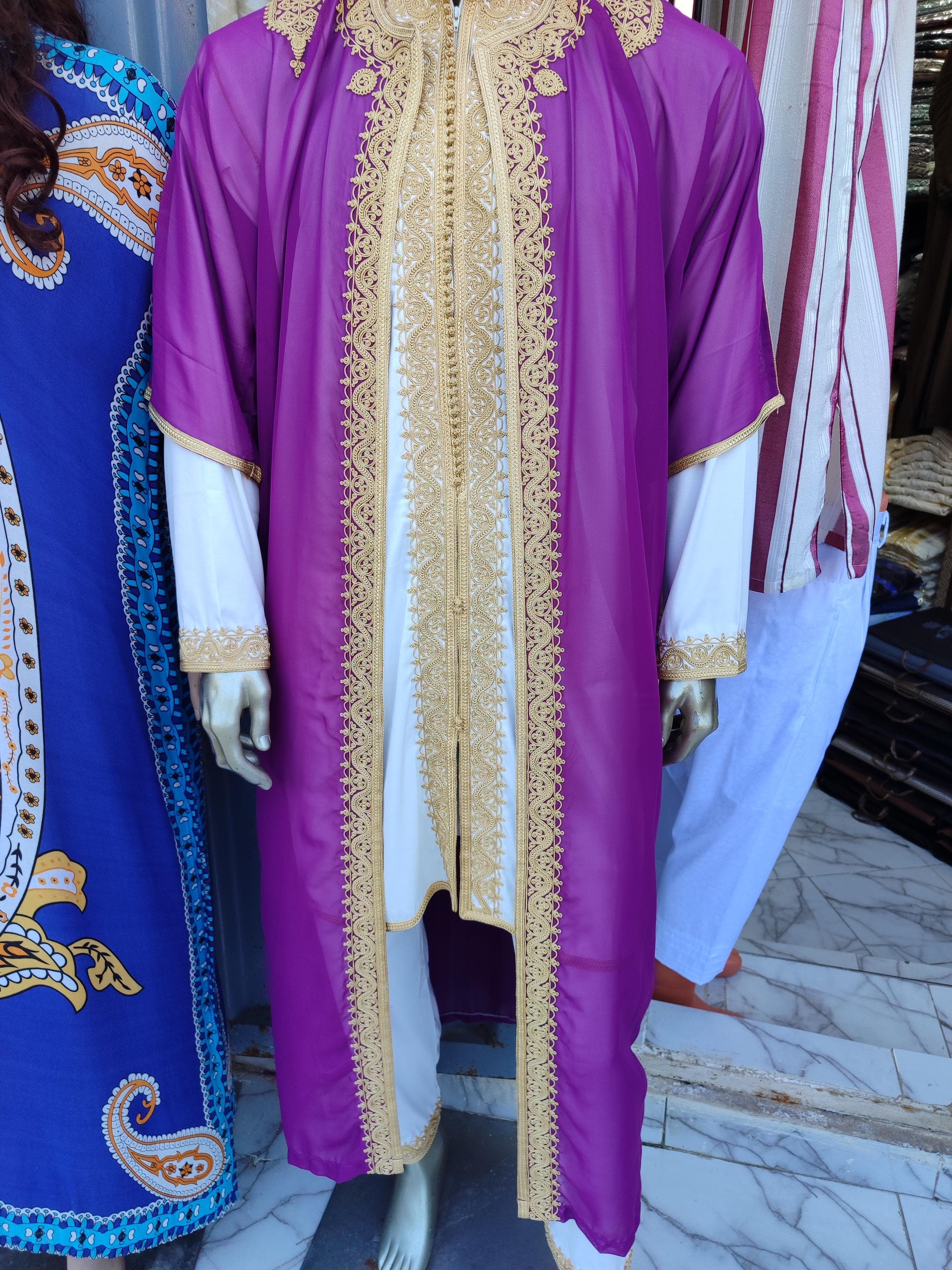 Step into your wedding or Nikah day with confidence in this luxurious jabador homme, designed for elegance and tradition. Whether you’re attending a Henna night or celebrating Eid al-Fitr, this jabador hena and wedding kaftan men design offers a regal touch. Handcrafted with Moroccan fusion elements, it's more than clothing—it’s a statement of heritage and modern Muslim wedding fashion.