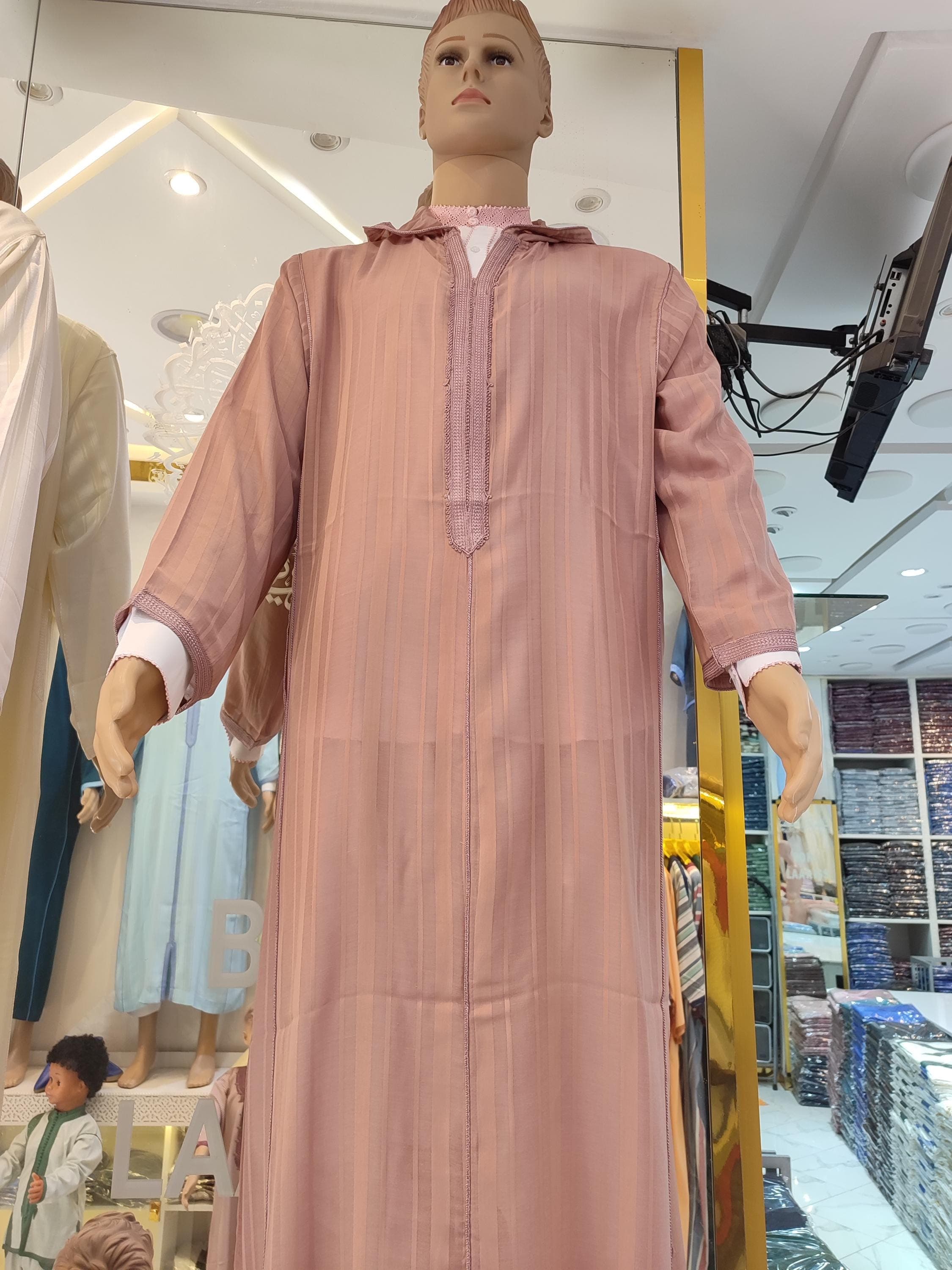 A unique fusion of Moroccan and Islamic fashion, this jabador for man combines the grace of a kaftan dress with the structure of a jubba. Perfect as an arabic dress for Ramadan or a stylish everyday thobe, this jalabiya men piece is handmade with care. From sousdi kaftan touches to traditional djellaba features, it's a standout in any muslim mens wear collection.