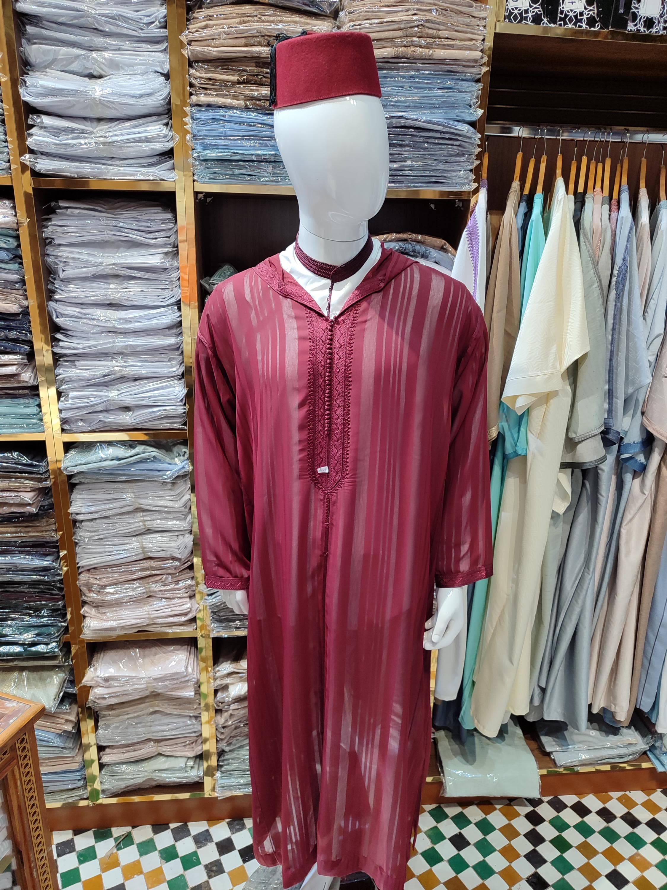 Crafted for comfort and style, this djellaba cotton is a must-have for Muslim men clothing. Made from soft, breathable fabric, this dejellaba is perfect for daily wear, Ramadan gatherings, or as a cool Islamic prayer dress. Its lightweight design and relaxed fit, characteristic of a classic gandoura for men, ensure all-day ease without sacrificing elegance. This versatile jalabiya is an essential piece of Moroccan clothing and a thoughtful,