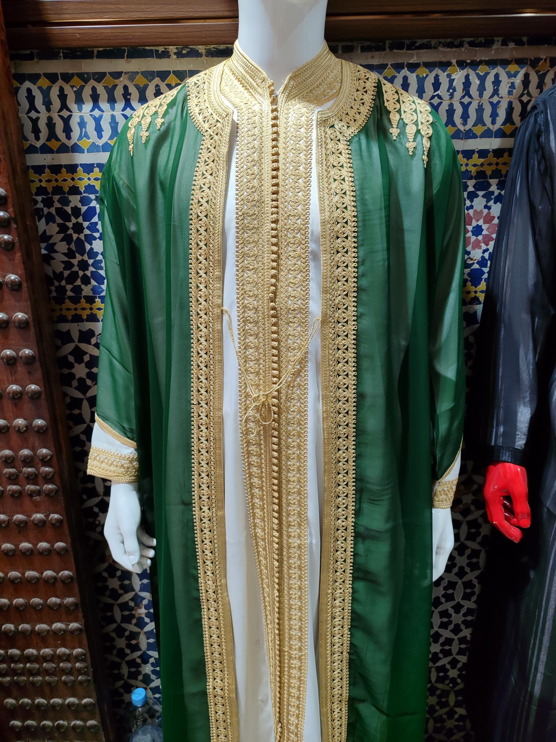 Celebrate tradition in style with this green and gold jabador for men. A refined choice for any special occasion, from Henna nights to Eid prayers, this jabador blends traditional Moroccan attire with modern tailoring. Featuring a luxurious design and fine Moroccan embroidery, it’s the ideal kaftan for men seeking elegance and identity. A standout among Arabic men’s wear and a perfect gift for any festive season.