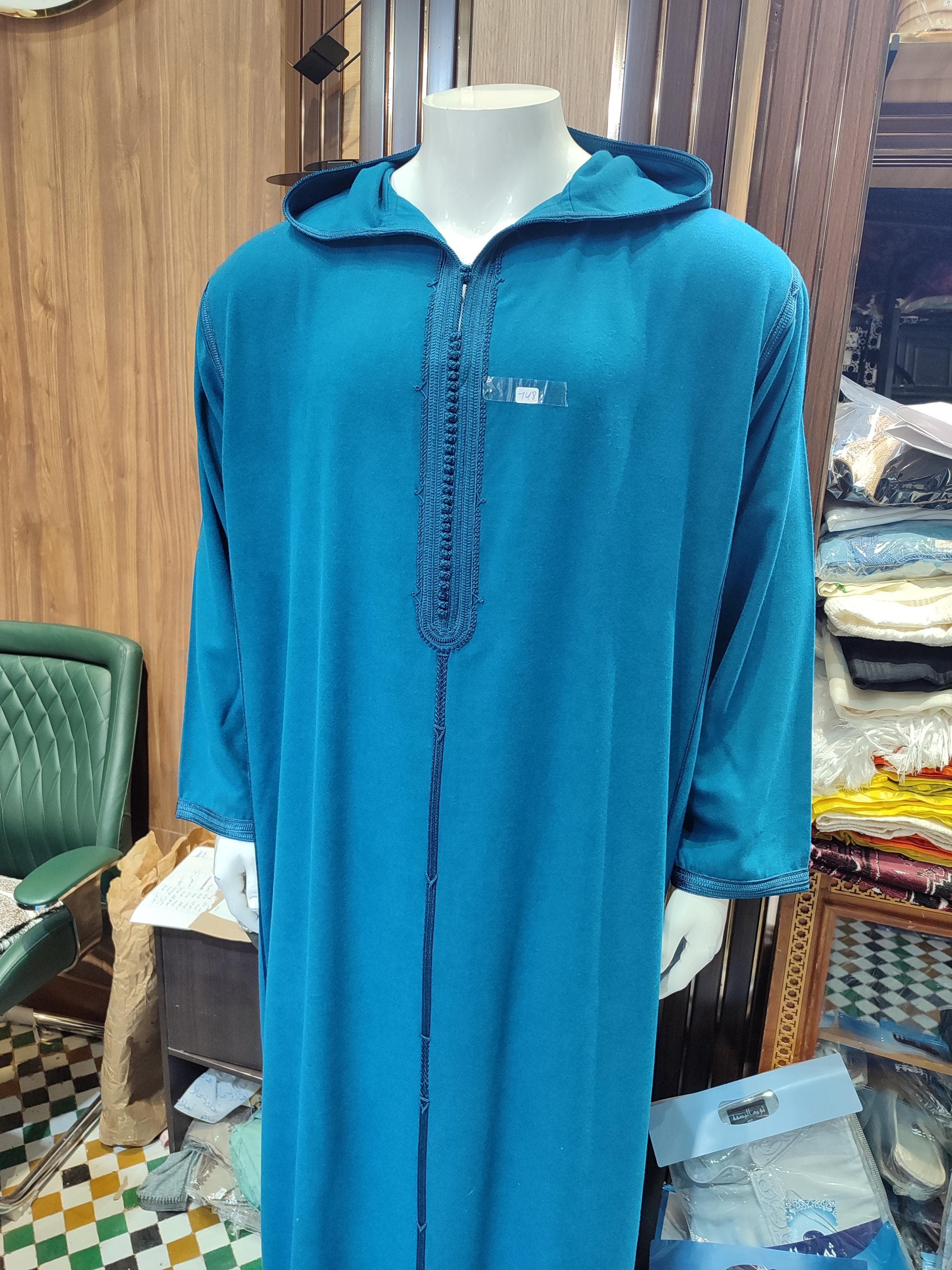 Experience authentic Moroccan craftsmanship with this luxurious wool djellaba. This Moroccan thobe combines traditional design with premium wool fabric, offering both warmth and sophistication. The hooded thobe design provides additional protection from the elements while maintaining cultural authenticity. Perfect for cold weather, special occasions, or daily wear in traditional communities. Features intricate embroidery and quality stitching that showcase excellent djellaba men craftsmanship.