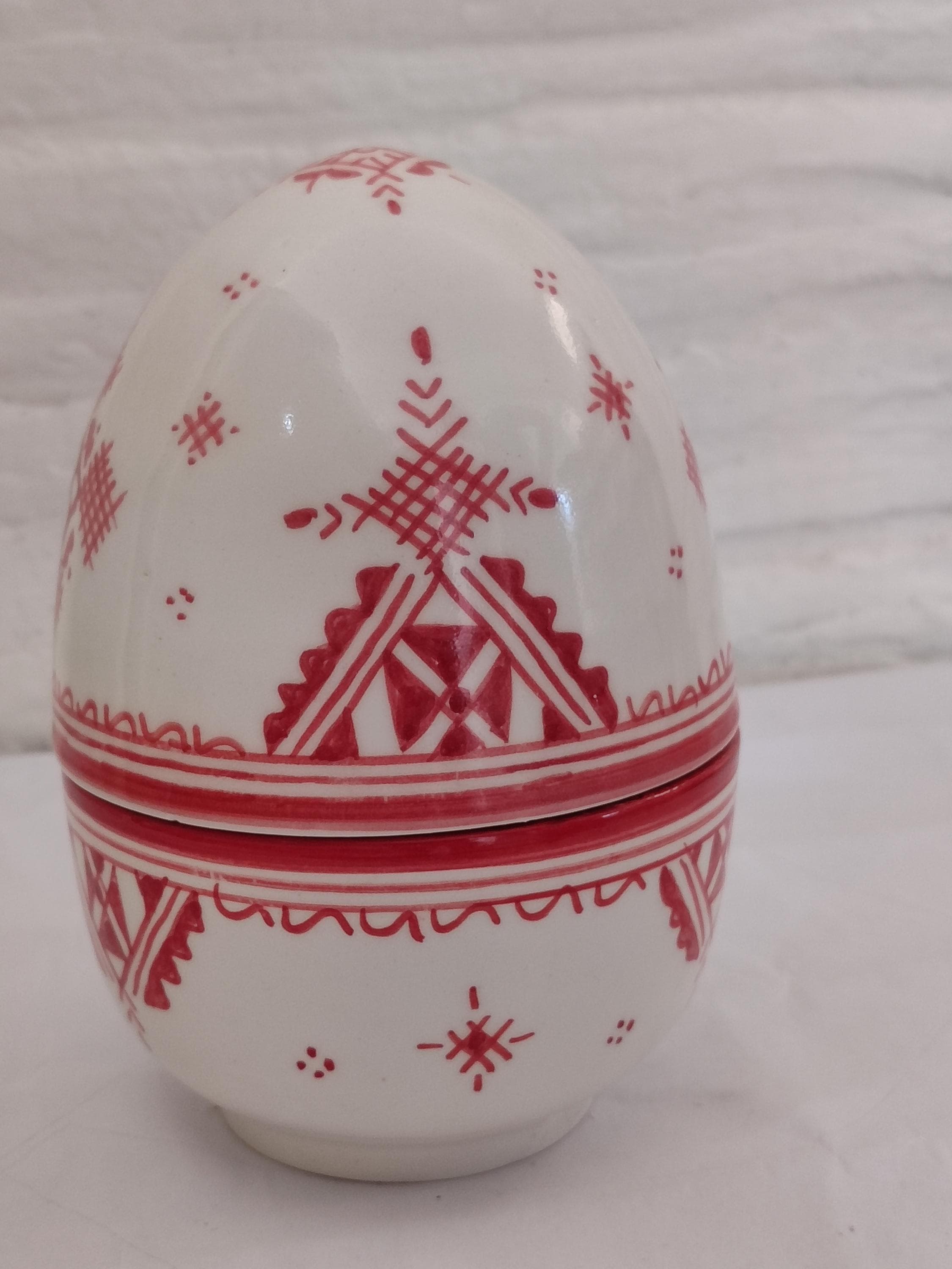 Discover this exquisite decorative egg, a beautiful fusion of Moroccan ceramic art and intricate Islamic art motifs. Meticulously handpainted by skilled artisans, this unique sculpture makes for a captivating piece of unique decor. It is a perfect cultural art gift for collectors and those who appreciate global craftsmanship. Each egg is made to order, ensuring a special and one-of-a-kind addition to your Moroccan decor collection or a thoughtful, symbolic gift.