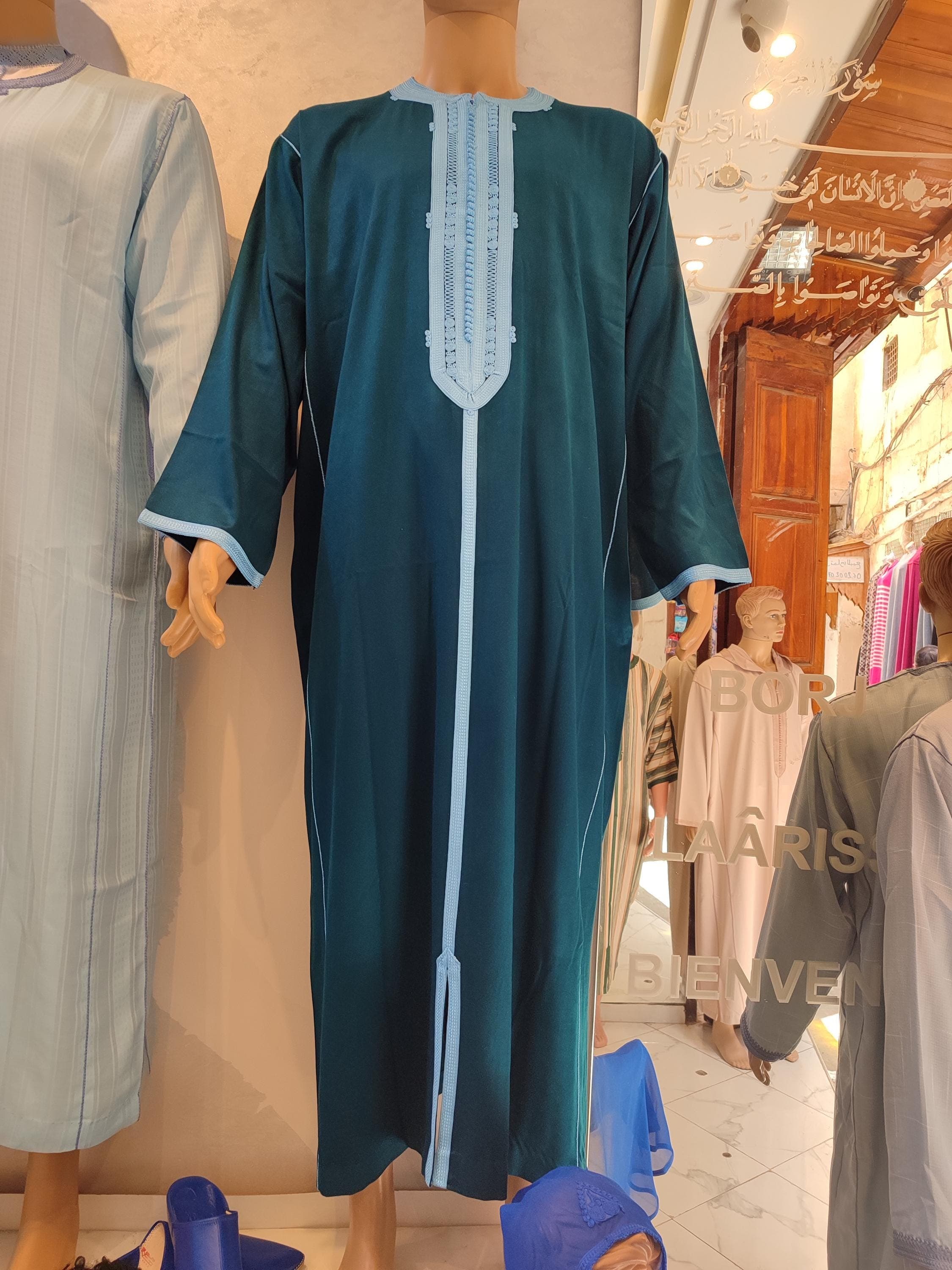 Discover timeless Islamic mens wear with this modern galabiyya, ideal for Friday prayers, Ramadan nights, or Nikah events. A luxurious jubba for Muslim men that doubles as a muslim evening dress or wedding outfit. Combines the practicality of a man prayer jacket with the elegance of a Saudi-inspired thobe for men.