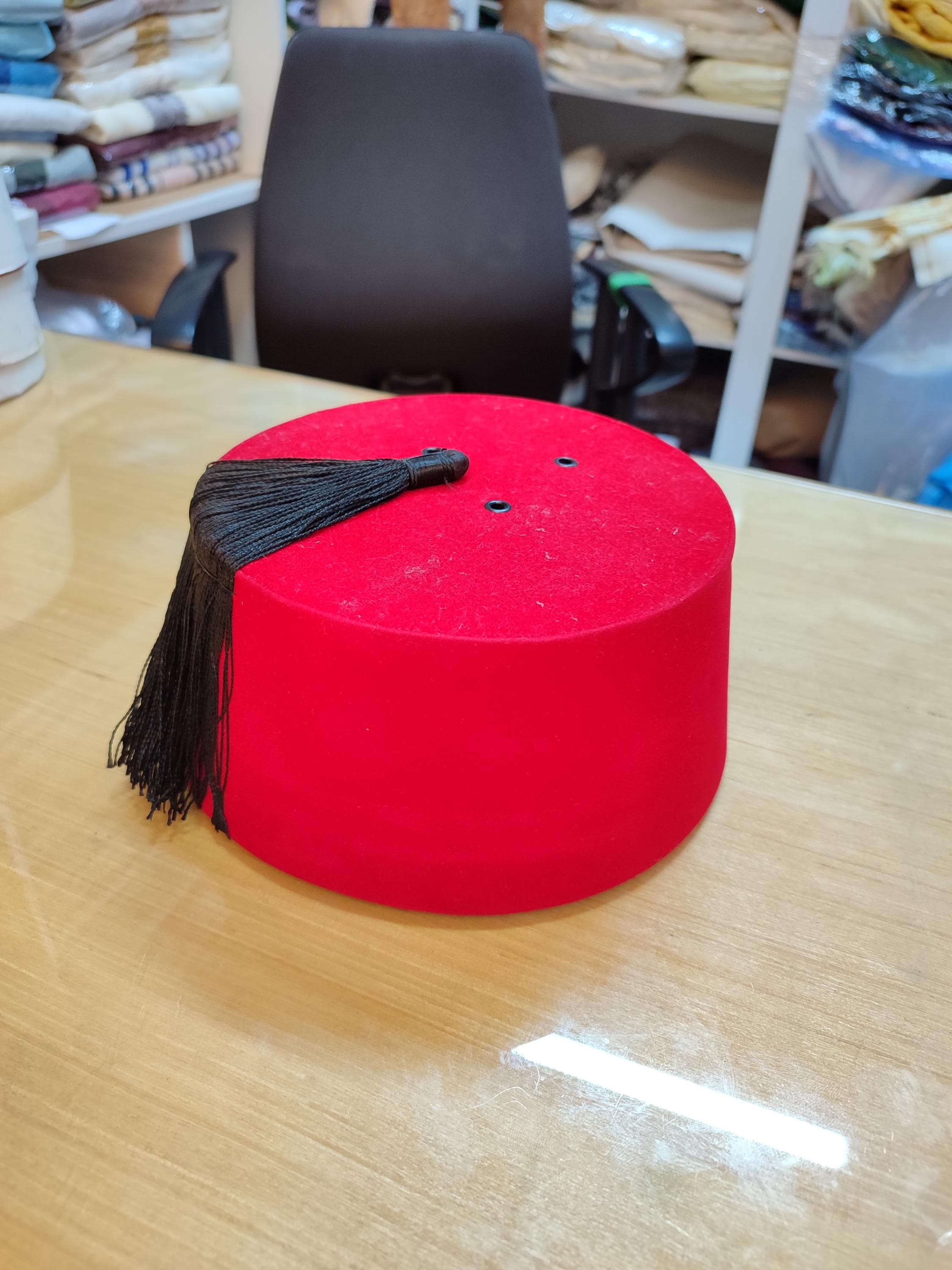 Elevate your attire with this exquisitely Handmade Fez Hat. Crafted with attention to detail, this Moroccan tarboush is made from high-quality materials for durability and comfort. Ideal as a ceremonial hat for weddings, religious events, or cultural celebrations, it also serves as a striking festival accessory. This chapeau marocain embodies a rich heritage, blending Moorish hat influences with classic Moroccan design. A perfect, unique gift for connoisseurs of traditional headwear.