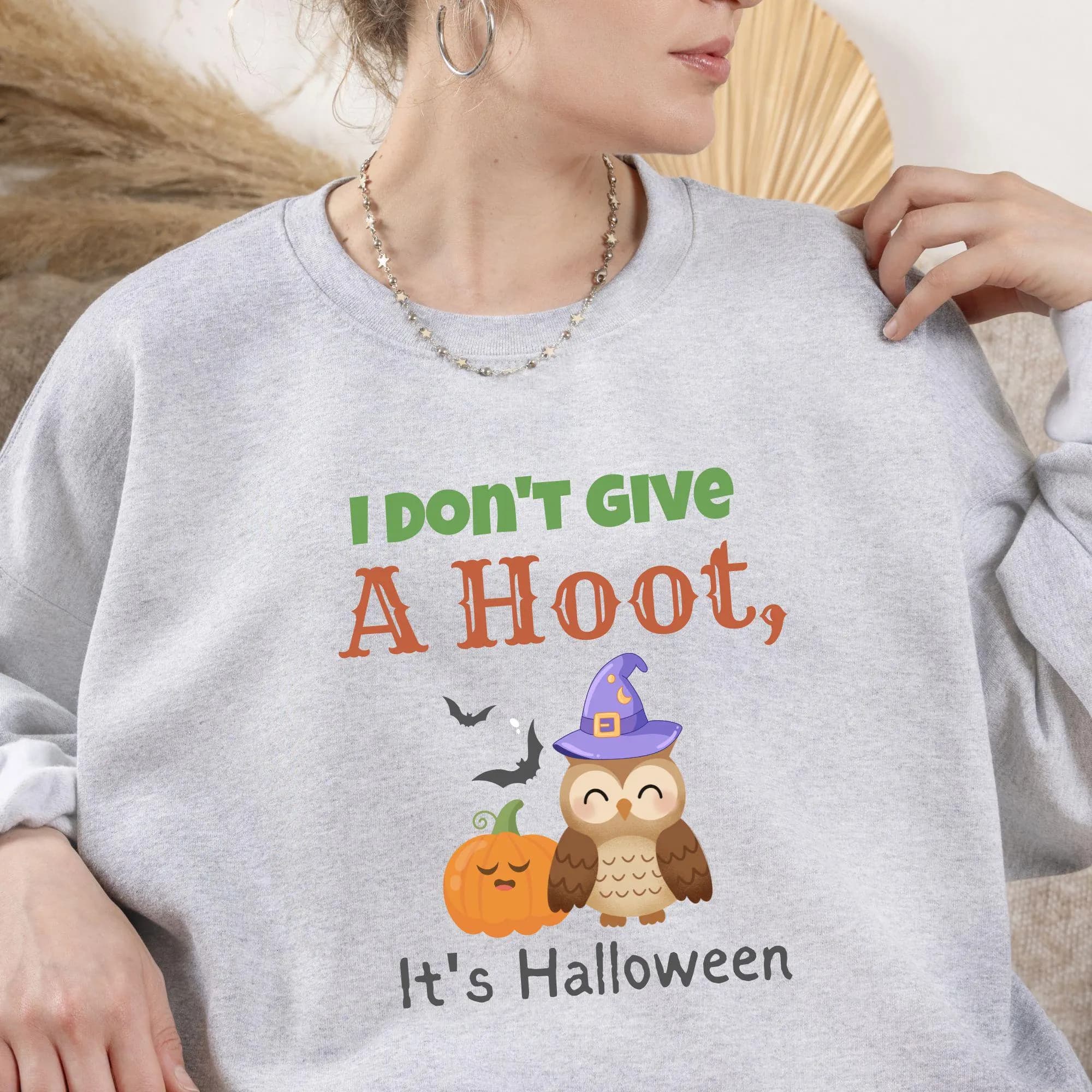 I Don't Give a Hoot It's Halloween PNG featuring a cute witch hat owl and pumpkin on a transparent background.