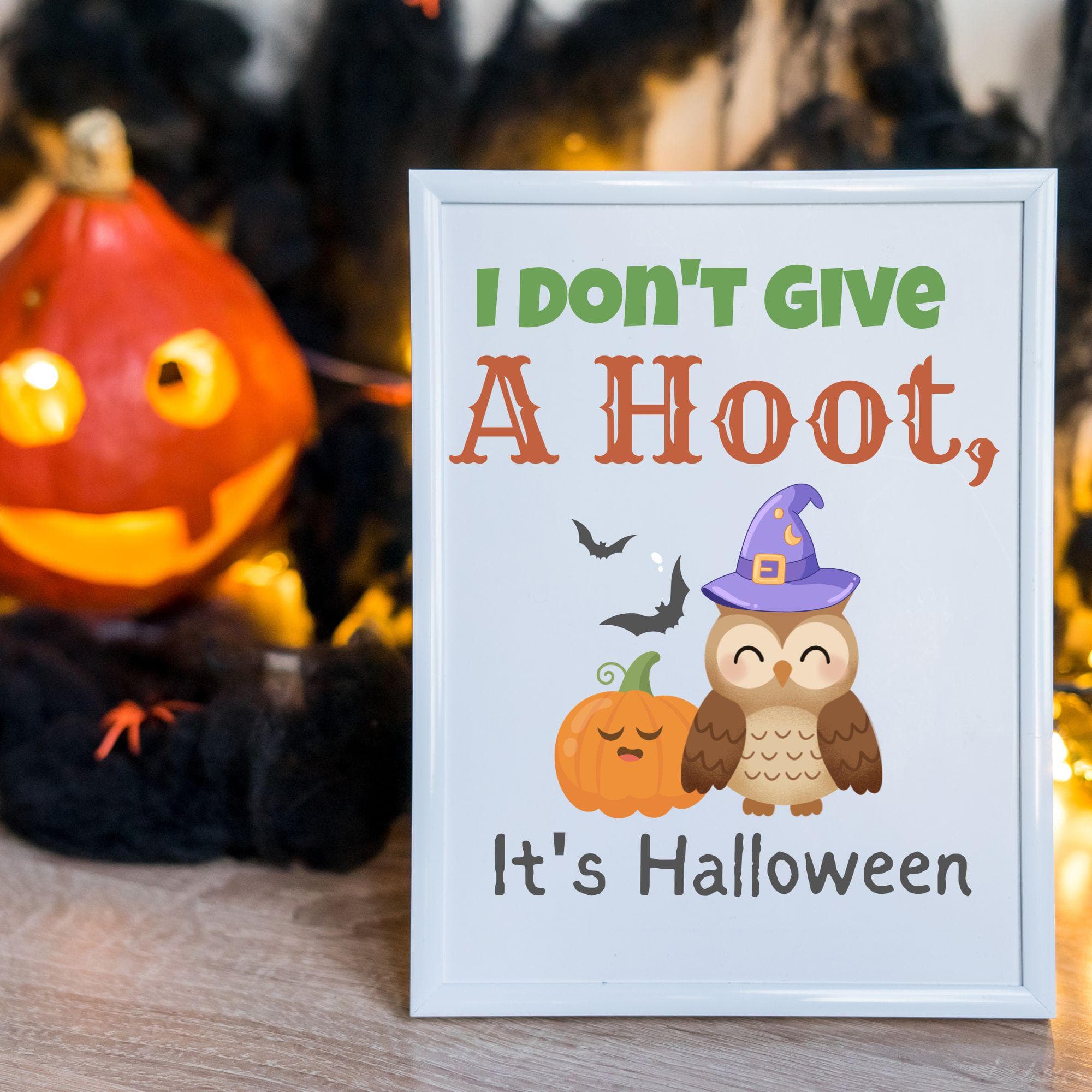 I Don't Give a Hoot It's Halloween PNG featuring a cute witch hat owl and pumpkin on a transparent background.