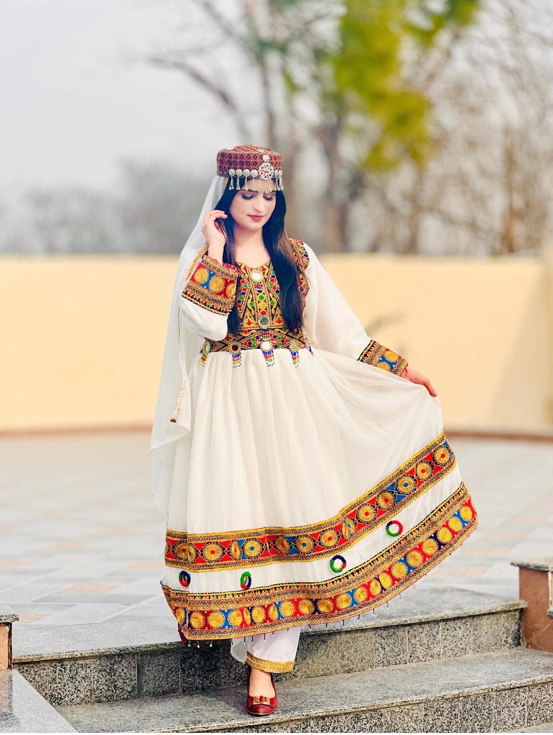 This is an dress also known by other names such as tribal dress  ethnic dress, Pakistani frock dress, Pathani frock, Indian dress, frock dress, white color frock The features include a high-quality chiffon frock, silk pants, and a chiffon dupatta