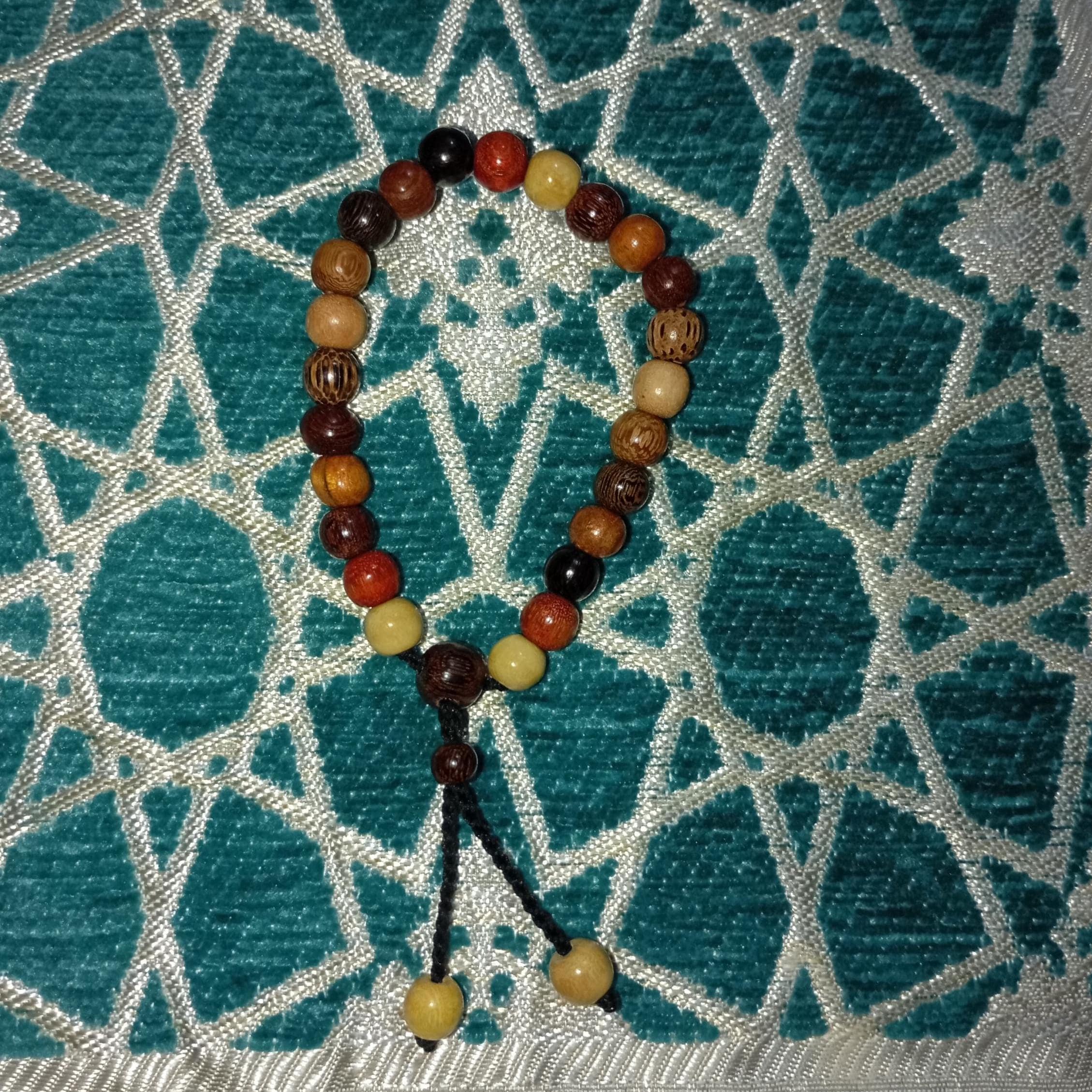 Indonesian Wood Bead Bracelet: Natural Aromatic Gemunggal, Kemuning, Ebony