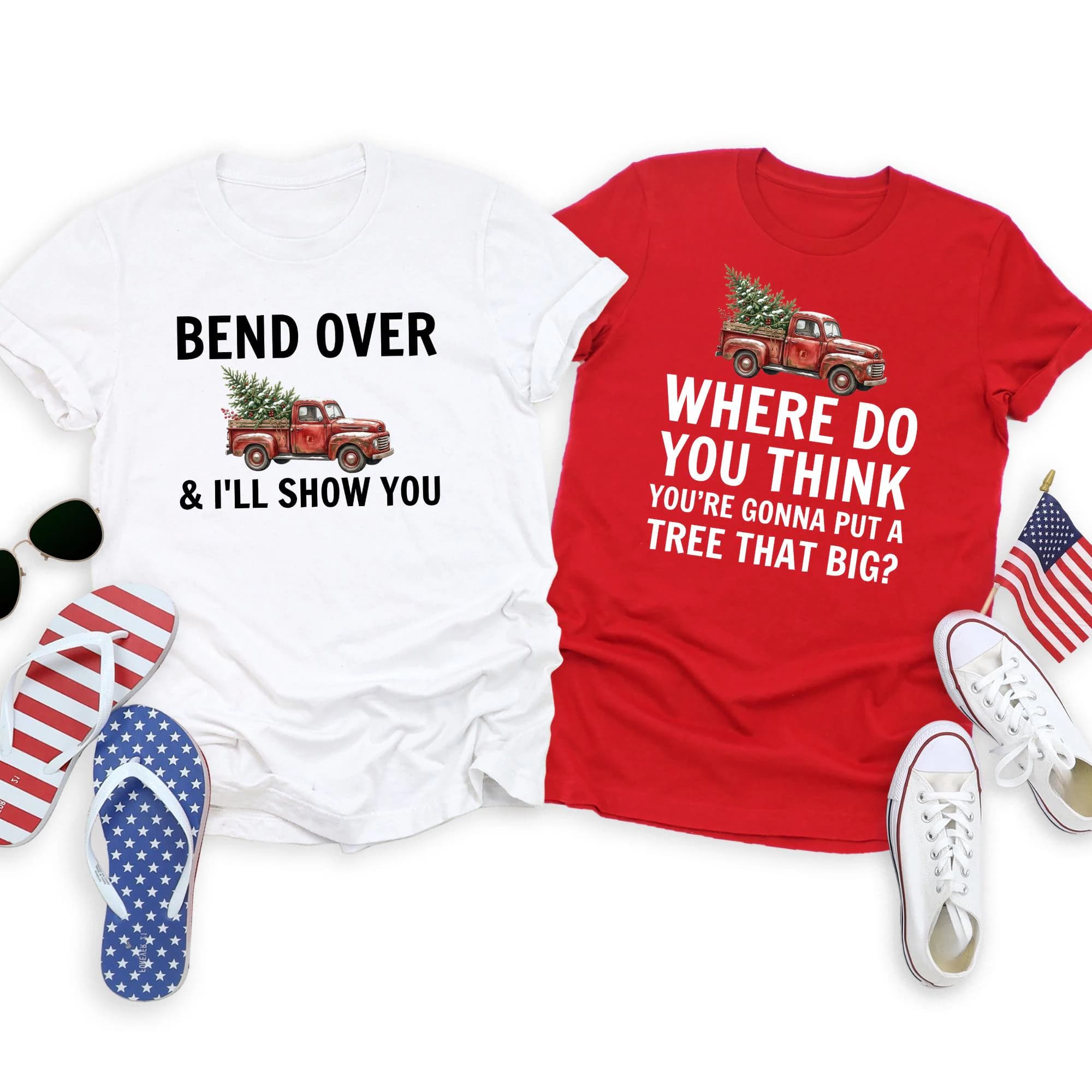 two t-shirts with humorous text and a red truck with a Christmas tree, along with a pair of white sneakers, a pair of sunglasses, and an American flag.