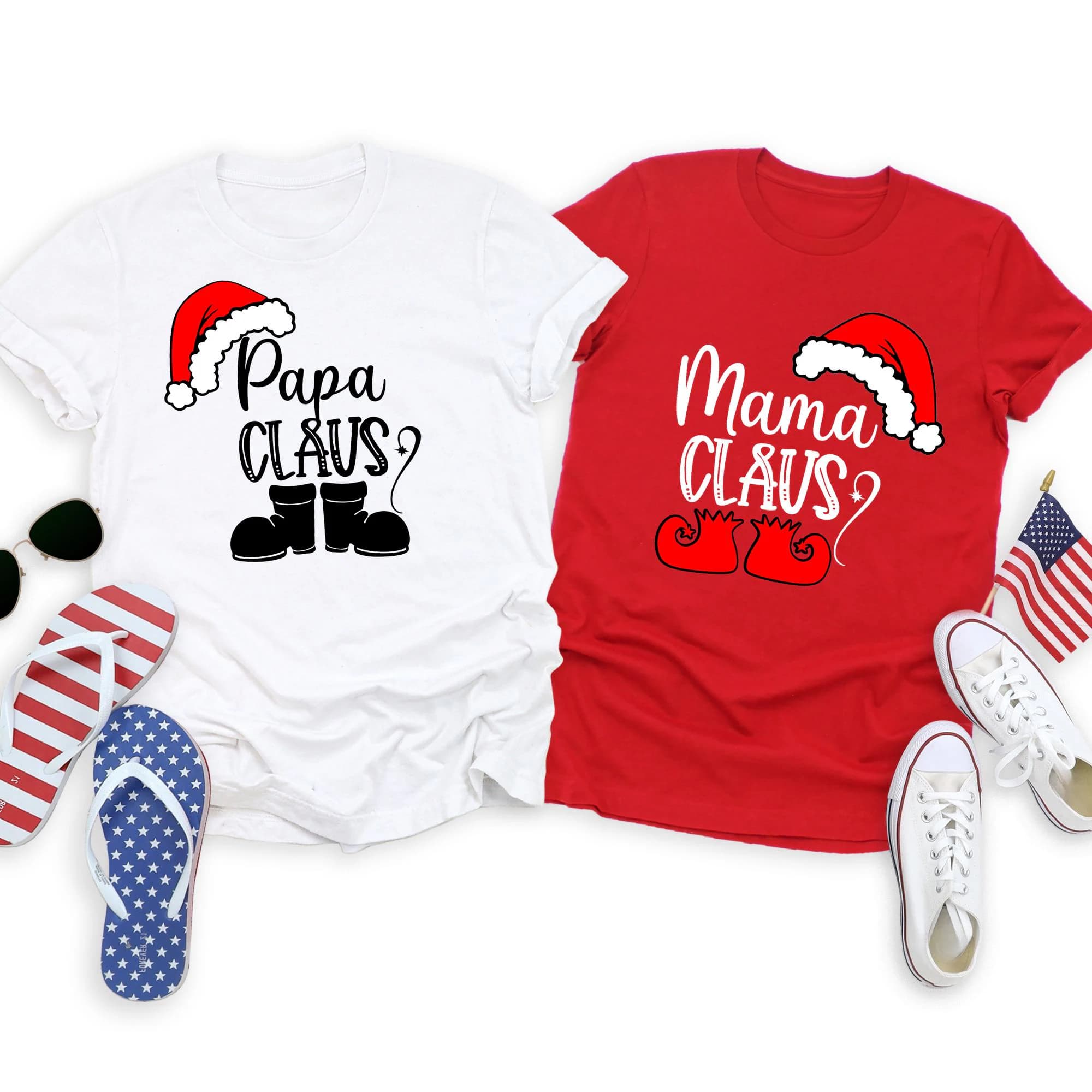 two t-shirts with Christmas-themed designs, one white and one red, along with a pair of flip-flops and a pair of sneakers.