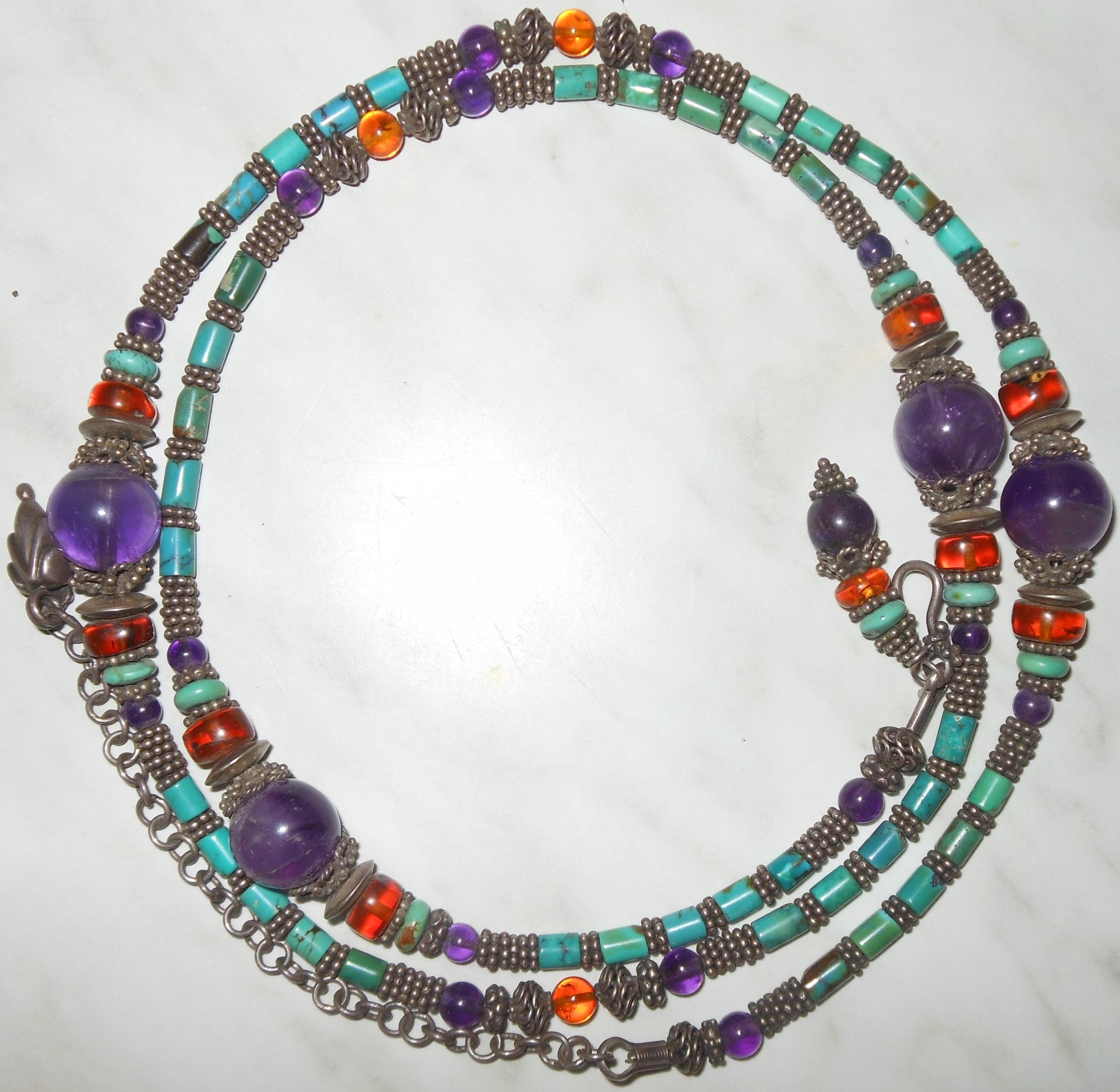 Importante collana Tibet argento, turchesi, ametista.