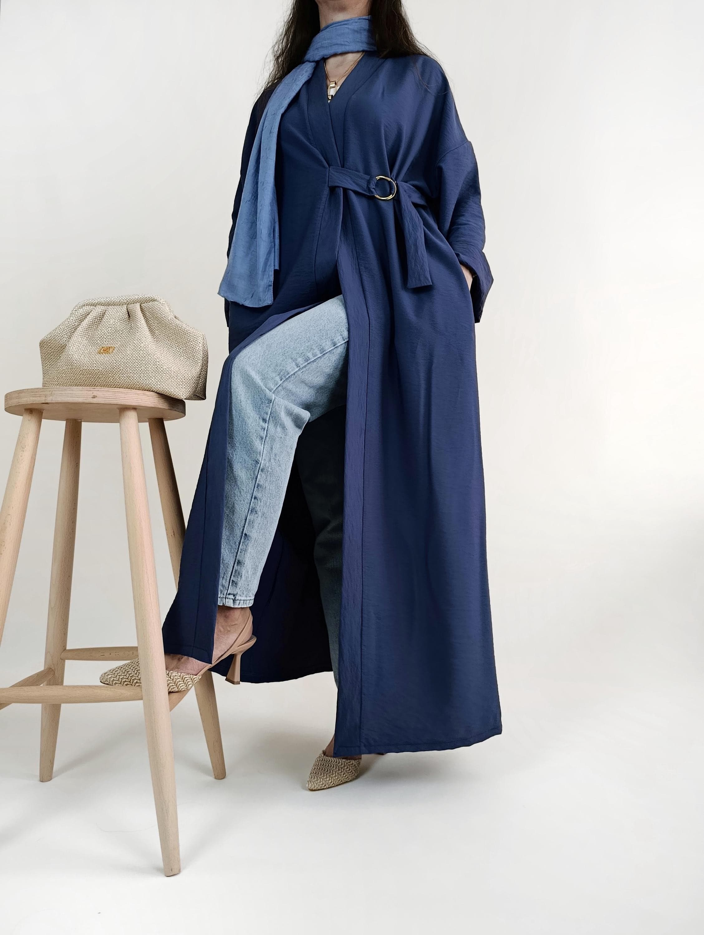 Oversized modest trench coat in indigo color, perfect for elegant everyday wear.