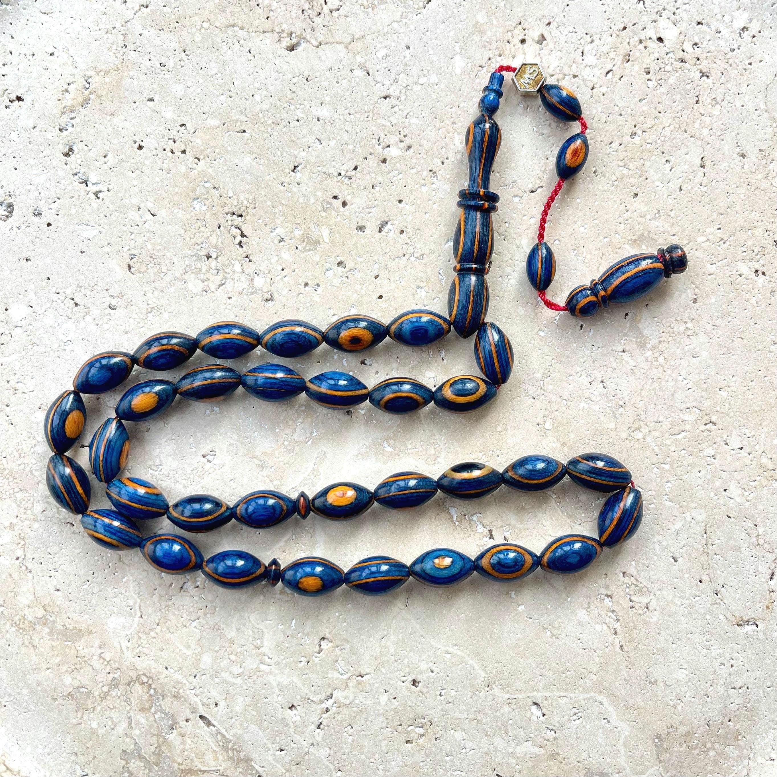 Handcrafted Camphor Wood Tasbih: Islamic Prayer Beads with Red Accents