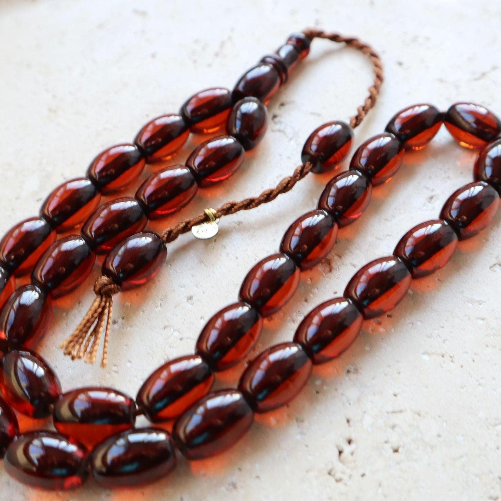 Handmade Fire Color Pressed Amber Tasbih | 33-Bead Islamic Prayer Beads - image 3