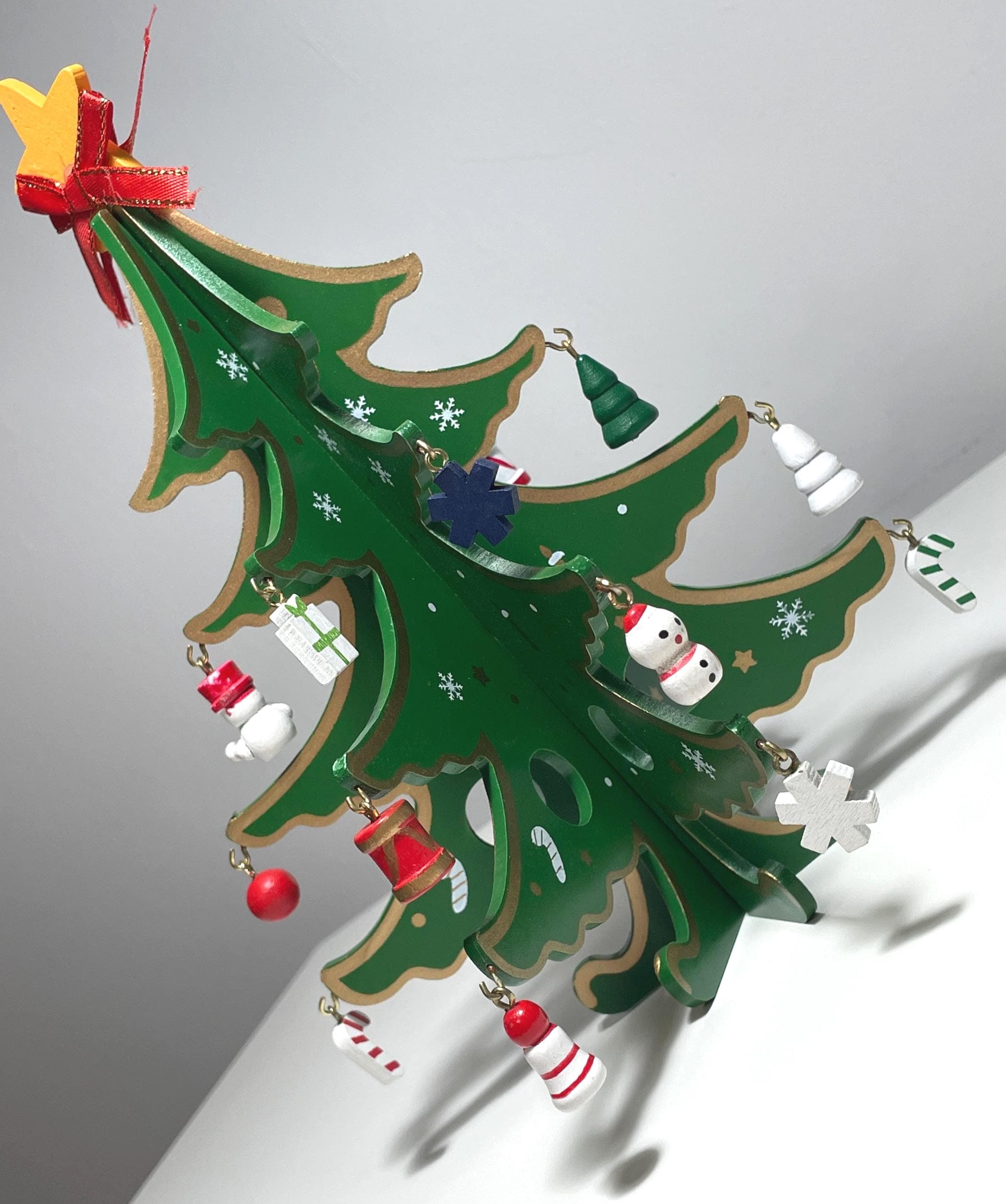 Bring instant holiday magic to your home with this DIY Wooden Christmas Tree Kit. Assemble, decorate, and display a charming tabletop tree in minutes—perfect for mantels, desks, shelves, classrooms, or gift tables. A fun family craft activity that doubles as beautiful holiday décor and a thoughtful seasonal gift.