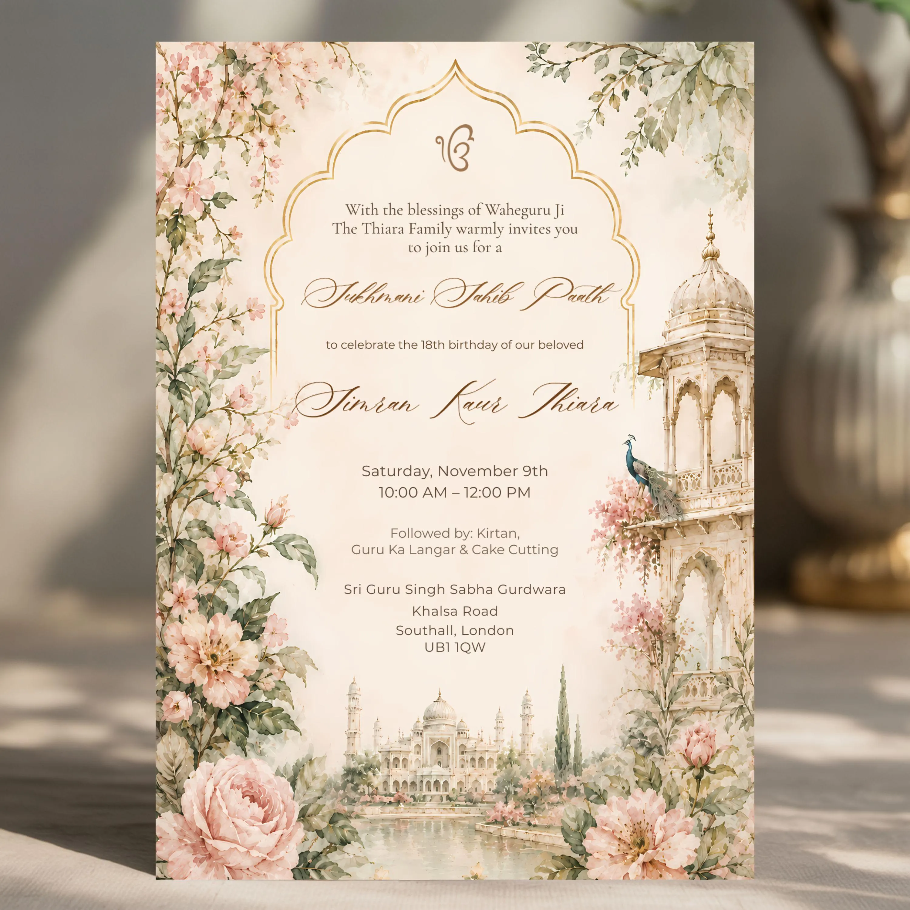 Editable Sikh invitation template with blush floral watercolor artwork, peacock illustration, gold arch frame and luxury South Asian aesthetic.