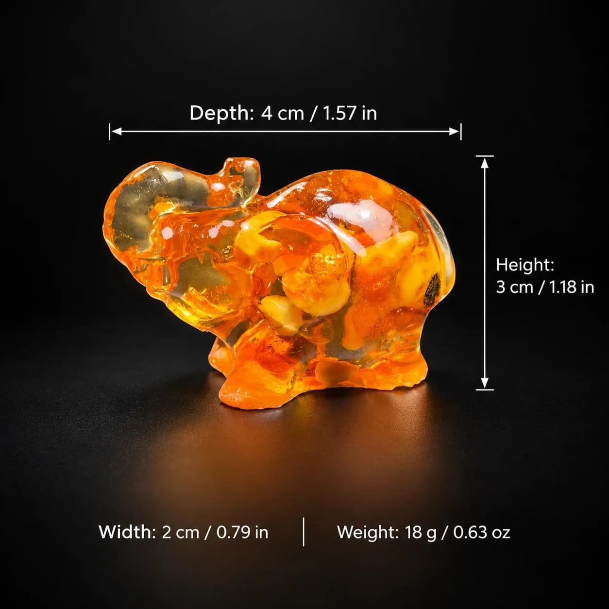 Size chart: KIZIMA® Baltic amber mini elephant, H 3 cm / 1.18 in, D 4 cm / 1.57 in, W 2 cm / 0.79 in, 18 g / 0.63 oz