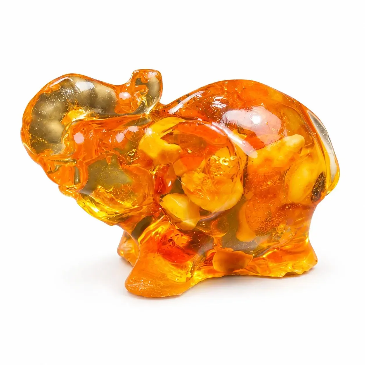 Natural Baltic Amber mini elephant figurine by KIZIMA®, white background — tiny lucky elephant gift