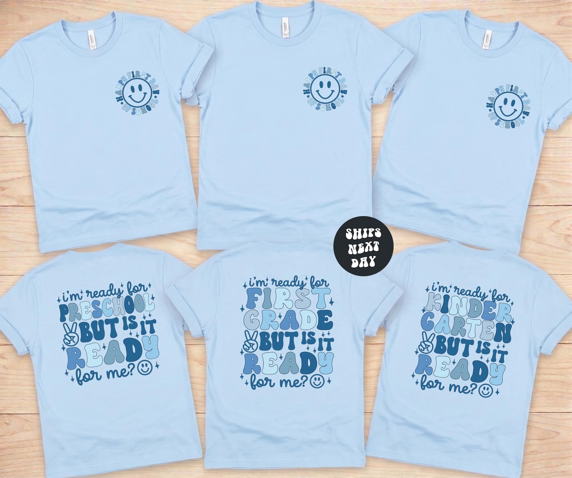 a collection of light blue t-shirts with various phrases and designs printed on them.