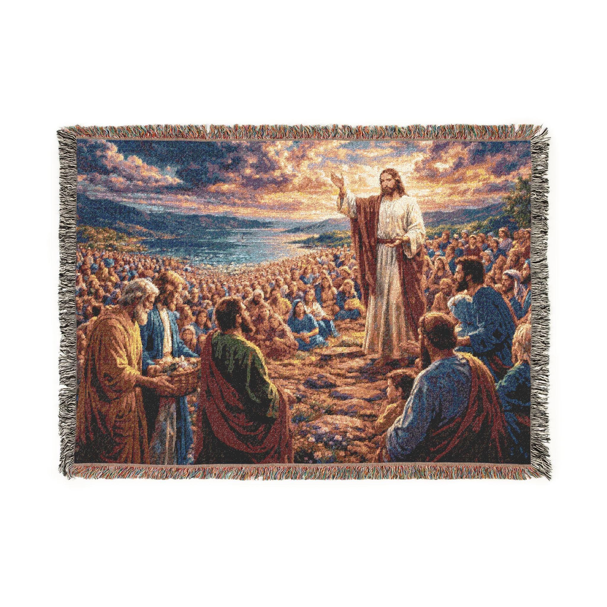 Woven tapestry wall hanging featuring Jesus teaching and feeding the multitude, surrounded by disciples and a large crowd under a glowing sunset sky beside the water. Christian Bible scene wall decor with rich woven texture and fringe, ideal for prayer room, church, living room, bedroom, or study. Also works as a woven throw blanket. Meaningful religious wall art gift for Christian family, Bible study group, baptism, confirmation, housewarming, and faith-centered home decor.