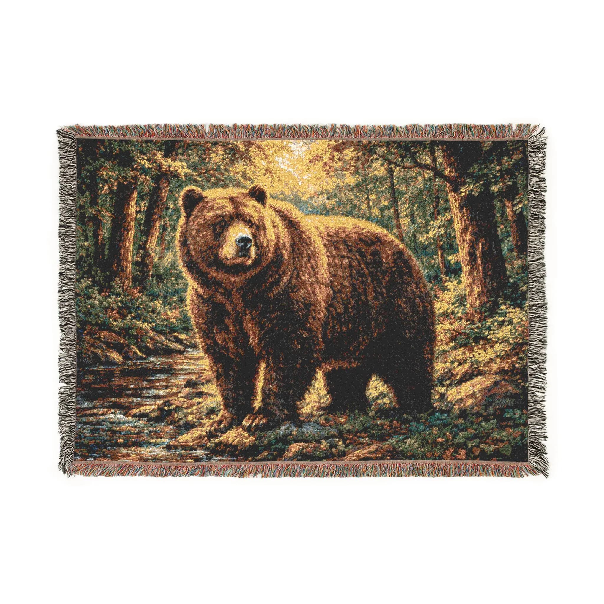 Woven tapestry wall hanging featuring a large brown bear standing beside a forest stream, surrounded by tall pine trees, mossy rocks, warm golden sunlight, and deep woodland shadows. Rustic wildlife wall art with peaceful forest scenery, earthy cabin colors, and nature inspired lodge style, ideal as a large wall tapestry, woven throw blanket, cabin wall decor, woodland room accent, national park style decor, and gift for bear lovers, hikers, campers, forest lovers, and rustic home decor fans.