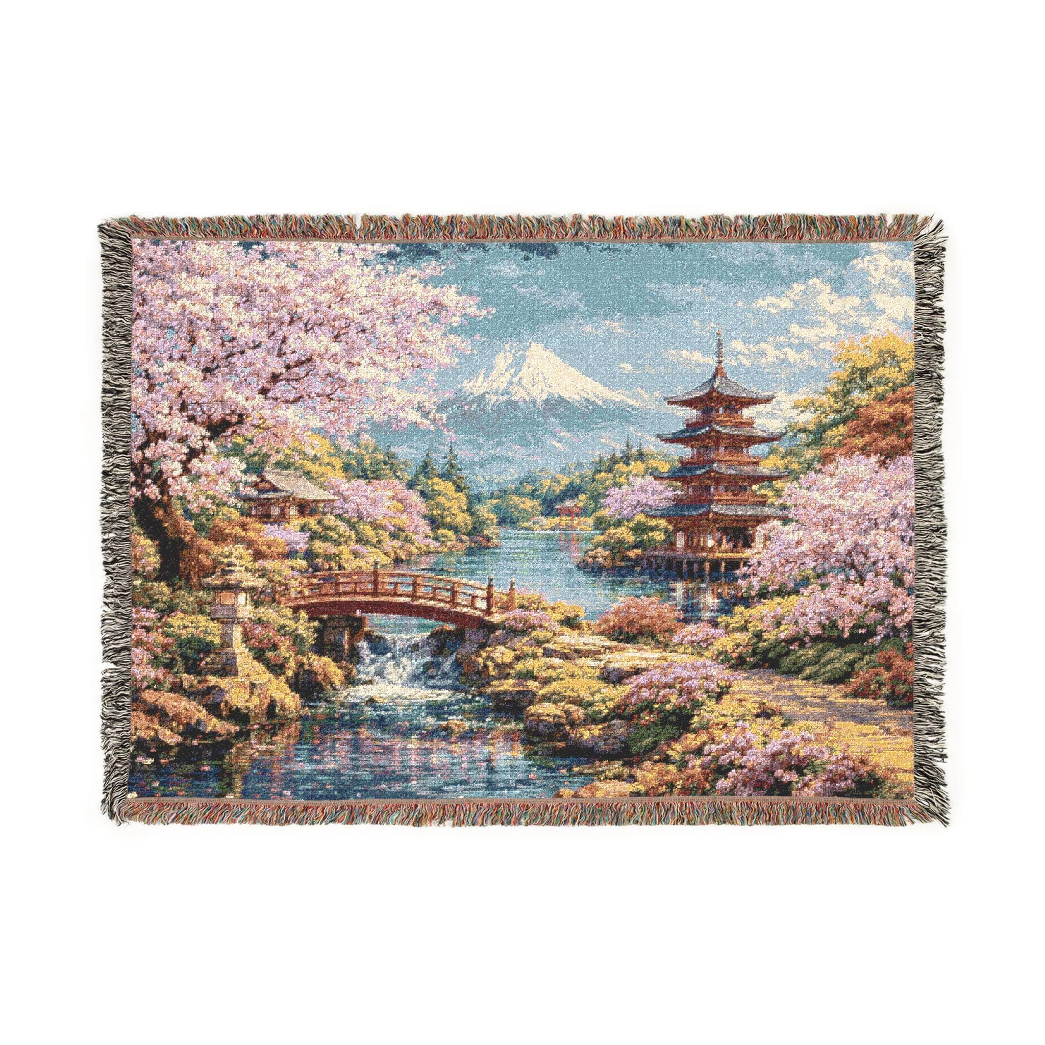 Woven tapestry wall hanging featuring a serene Japanese garden with blooming cherry blossom trees, a red bridge over a waterfall, reflective pond, traditional pagoda, Mount Fuji, spring flowers, and soft blue sky. Scenic sakura wall art with peaceful zen mood, pastel floral color, and Asian landscape detail, ideal as a large wall tapestry, woven throw blanket, Japanese home decor, meditation accent, reading nook art, and gift for cherry blossom lovers, Japan decor fans, and scenery collectors.