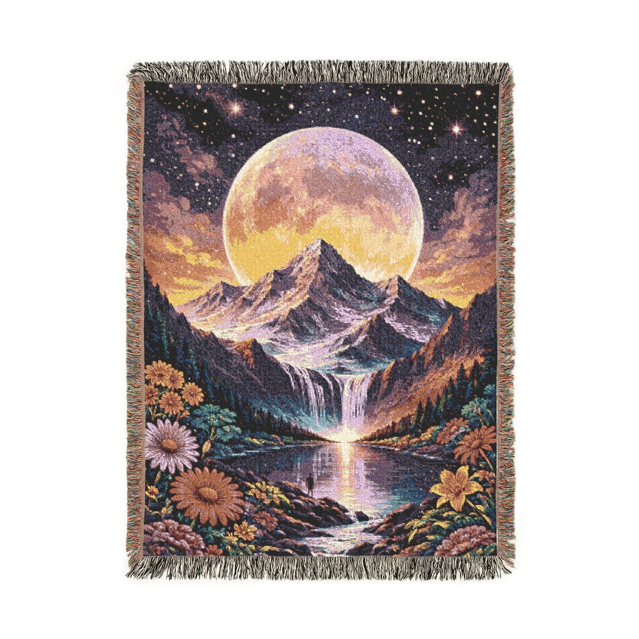 Woven tapestry wall hanging with a giant full moon behind snowcapped mountains, a glowing waterfall into a calm lake, and wildflowers by a rocky stream under a starry night sky. Moody tapestry wall art with twilight colors and fringe edges for bedroom, living room, cabin, or reading nook. Doubles as a woven throw blanket for nature lovers and moon gazers. Sweet housewarming or birthday gift. Mountain lake decor vibe, boho wall decor, cottagecore aesthetic, dreamy landscape tapestry.