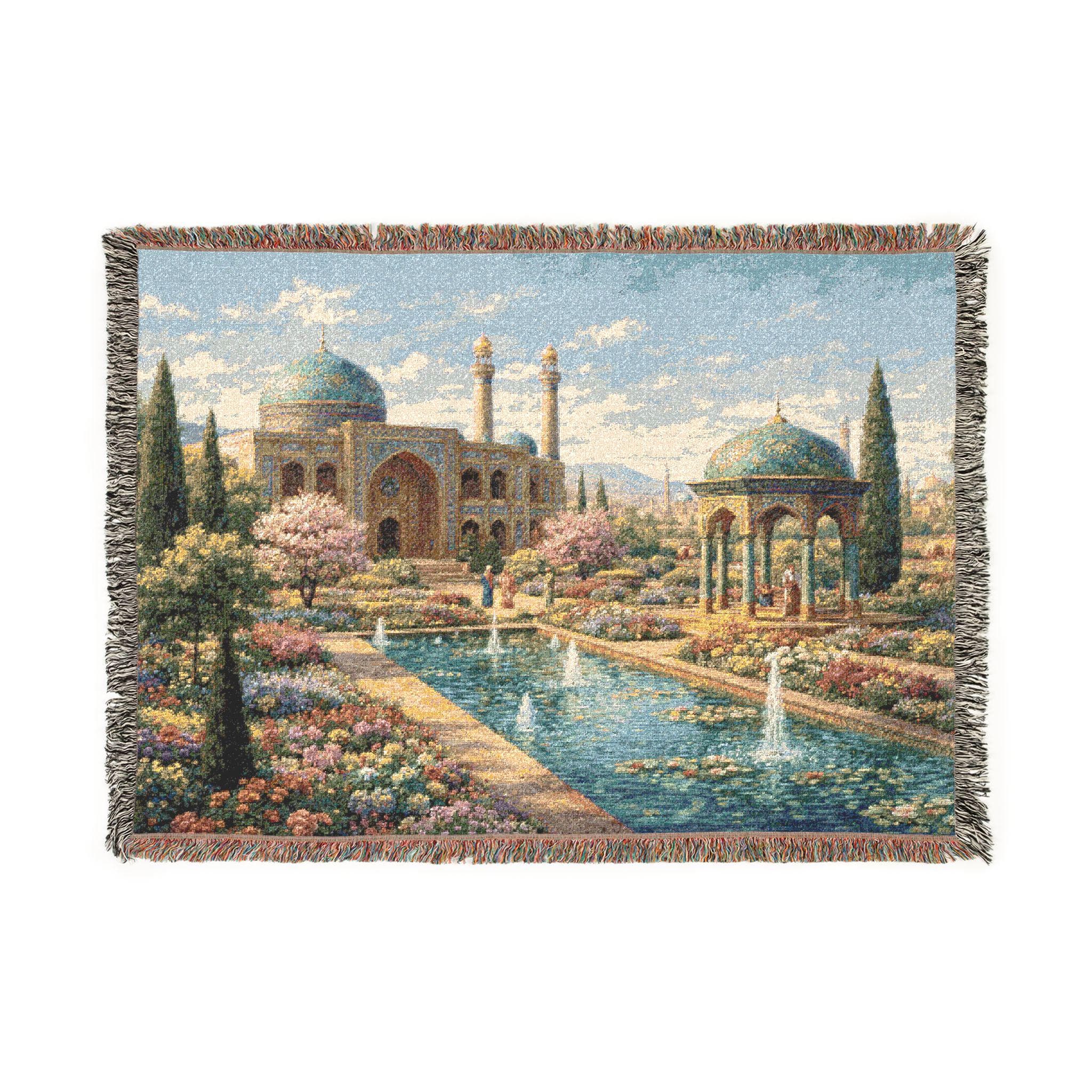 Woven tapestry wall hanging featuring a peaceful Persian garden with turquoise domes, ornate Islamic architecture, flower-lined paths, cypress trees, reflecting pool, fountains, and a pavilion under a bright blue sky. Elegant Middle Eastern wall art with floral courtyard scenery and vintage woven texture, ideal as a large wall tapestry, decorative throw blanket, palace garden decor, reading nook accent, and statement piece for architecture lovers, garden lovers, and old world decor collectors.