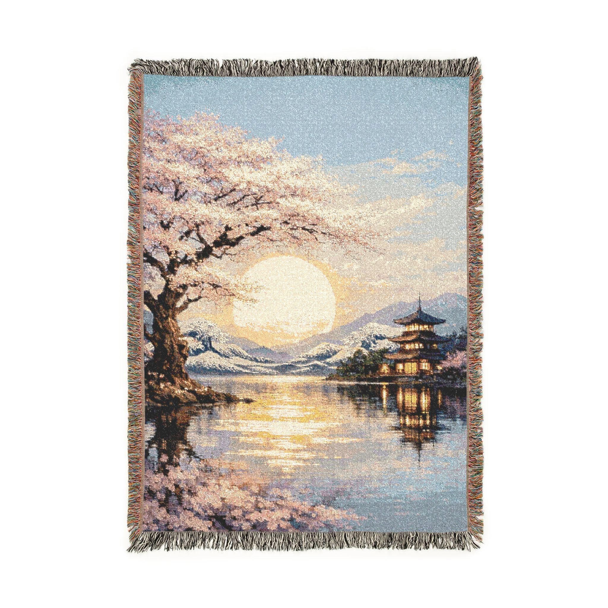 Woven tapestry wall hanging featuring a serene Japanese inspired lakeside scene with a blooming cherry blossom tree, a glowing sunset sun, calm reflective water, a lit pagoda, distant snowy mountains, and soft pink blossoms along the shore. Scenic sakura wall art with peaceful zen decor mood and warm evening light, ideal as a large wall tapestry, decorative throw blanket, bedroom accent, and gift for cherry blossom lovers, Japan decor fans, and tranquil landscape collectors.